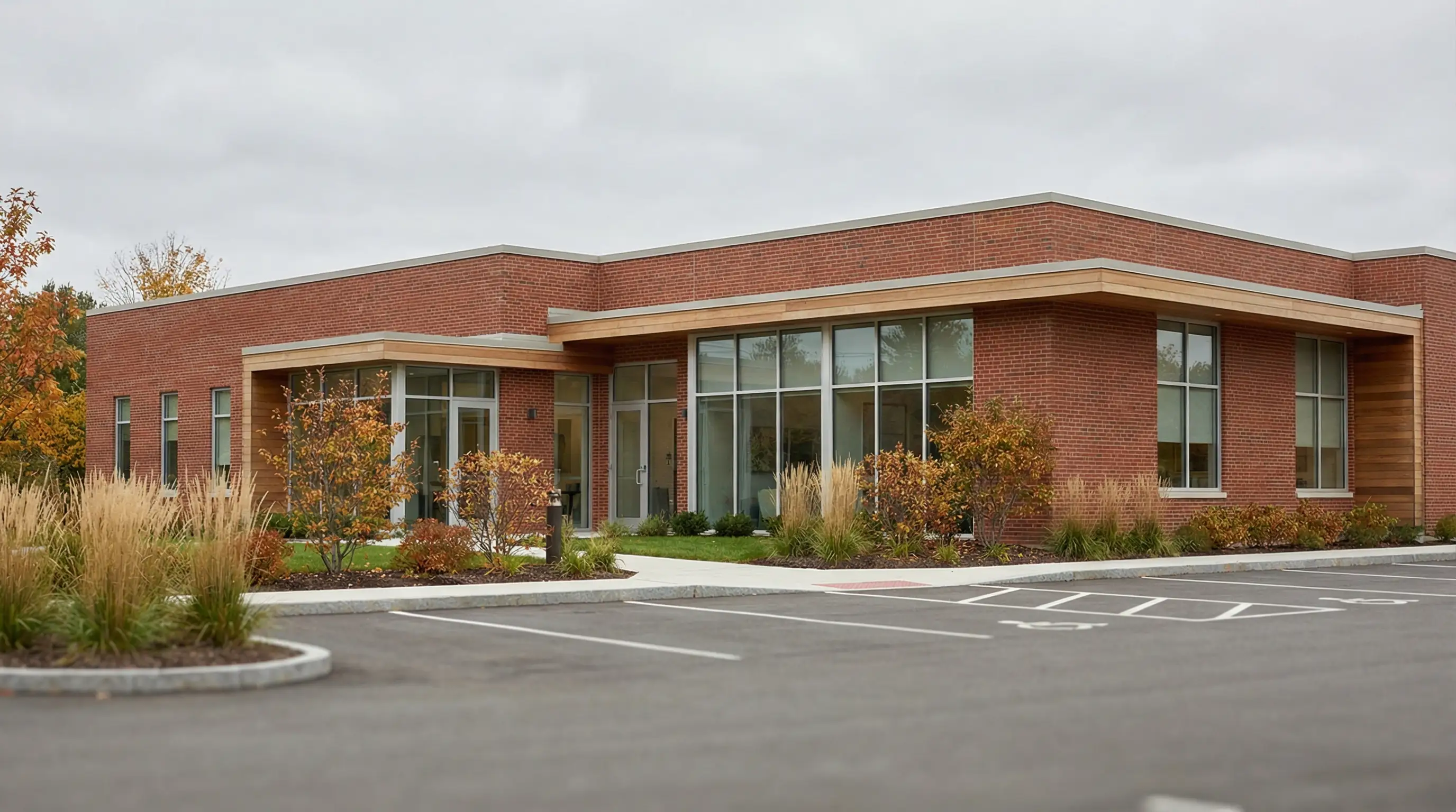 Modern dental practice consultation room in Hartford, CT suburb with dentist reviewing digital X-rays with patient