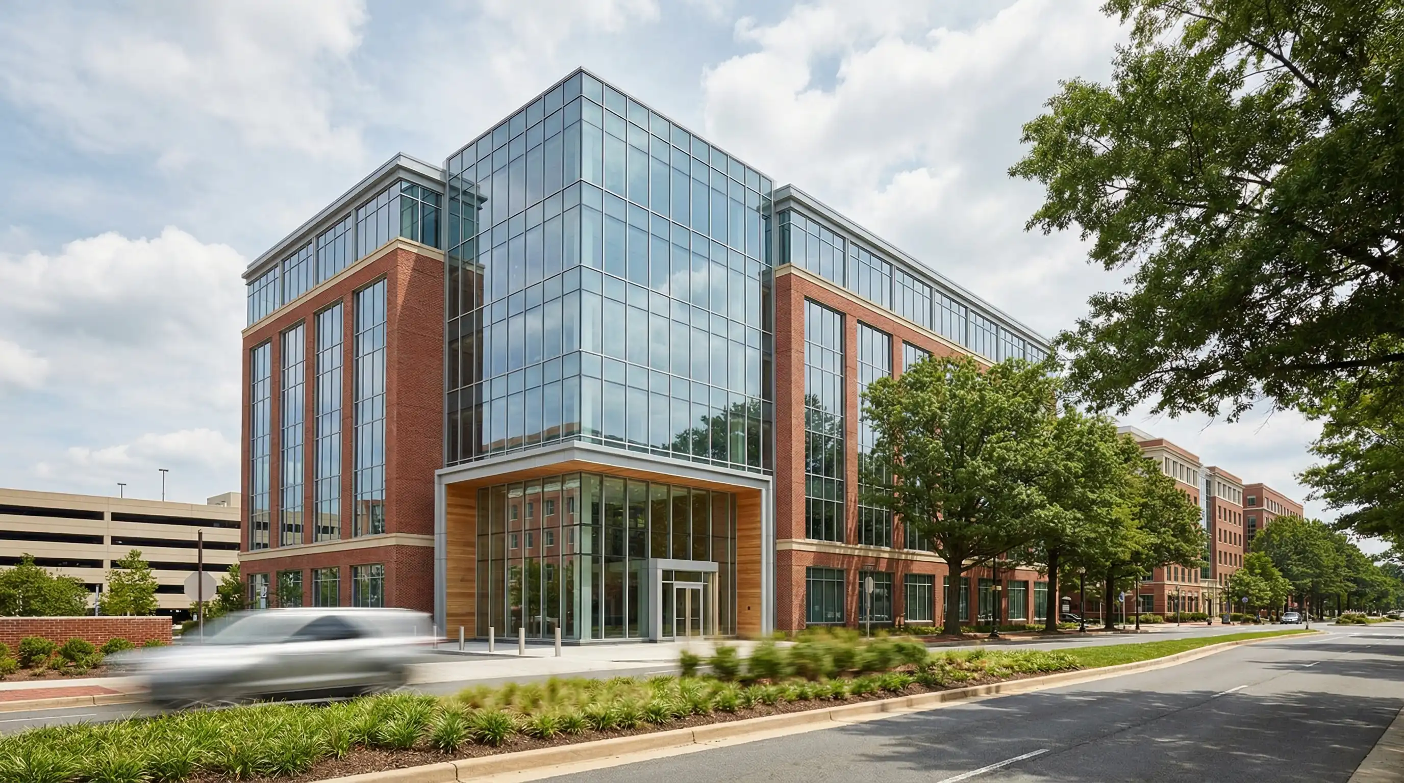 Professional IT technician configuring network equipment in a clean, well-organized server room inside a small office building in Alexandria, VA