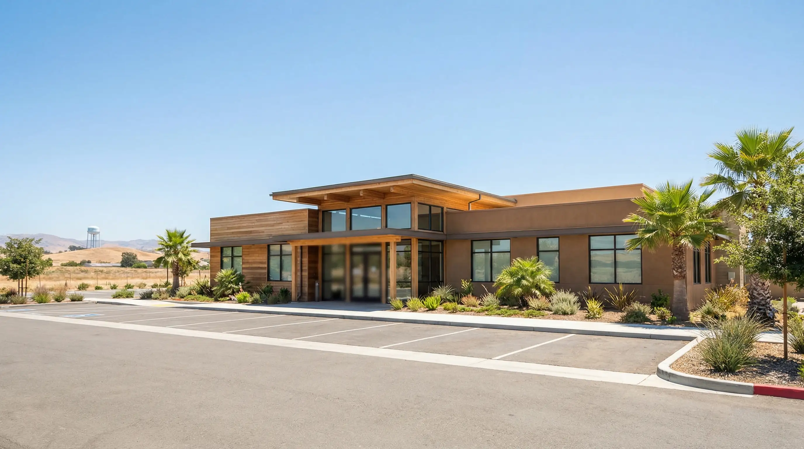 Professional dentist performing an examination in a modern dental office in Visalia, CA, with patient comfortably seated in dental chair