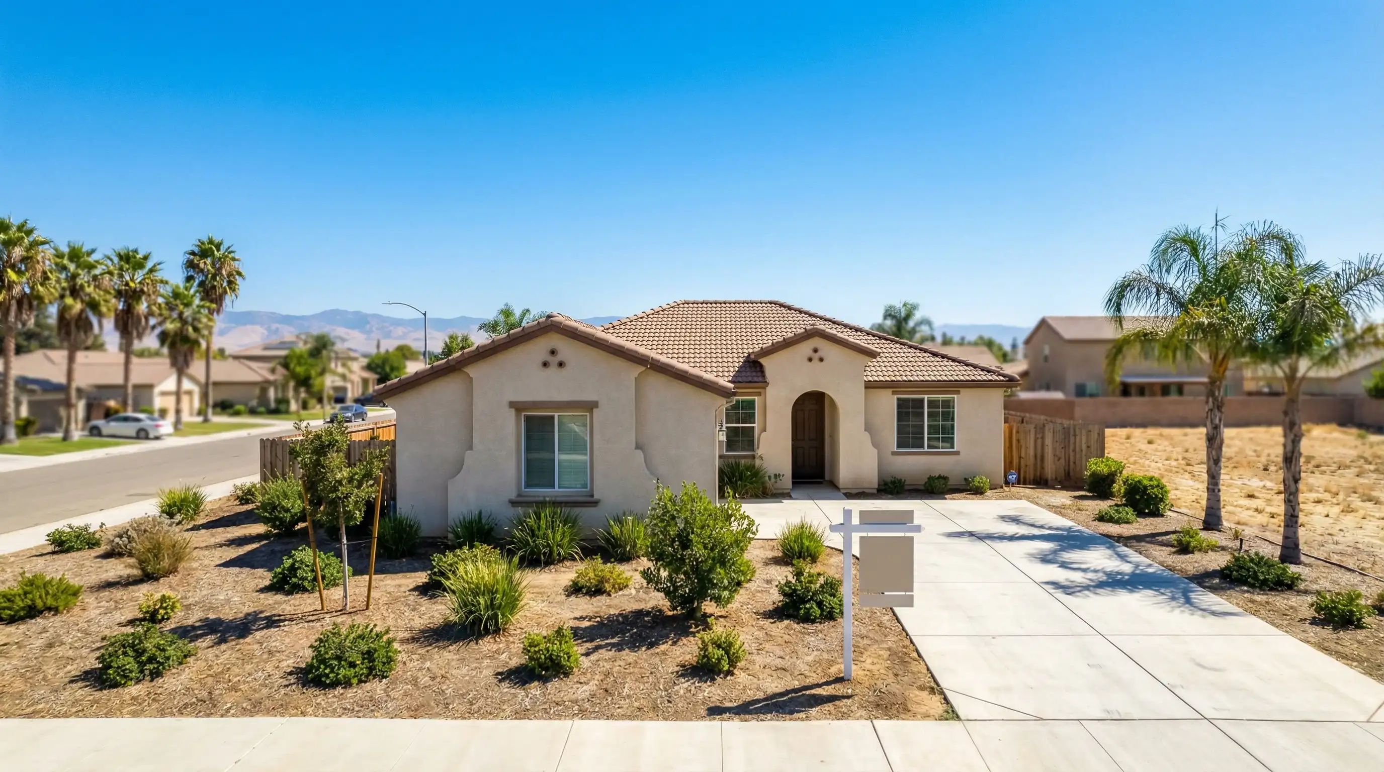 Professional real estate agent showing home listings to clients in Visalia, CA