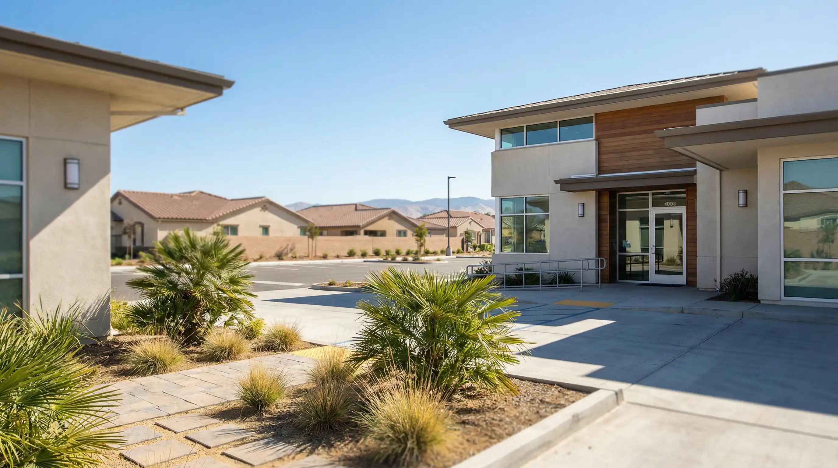 Welcoming medical clinic exterior in Visalia, CA with professional signage and accessible entrance in Central Valley sunshine