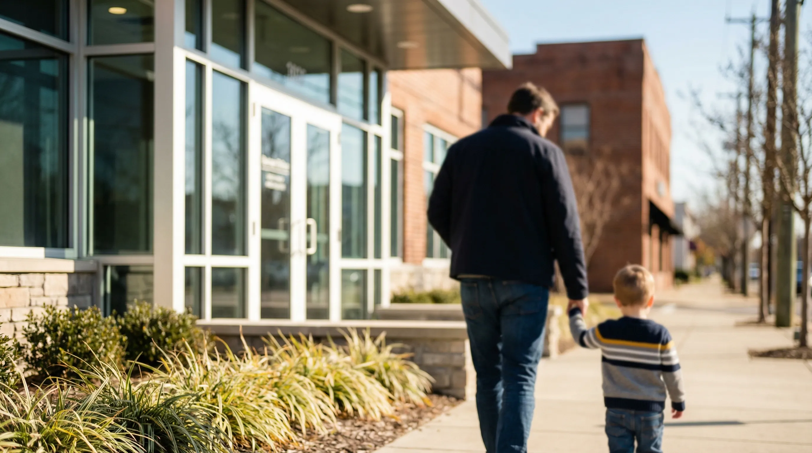 Dental hygienist treating a patient in a modern Hampton, VA dental office with coastal-themed decor