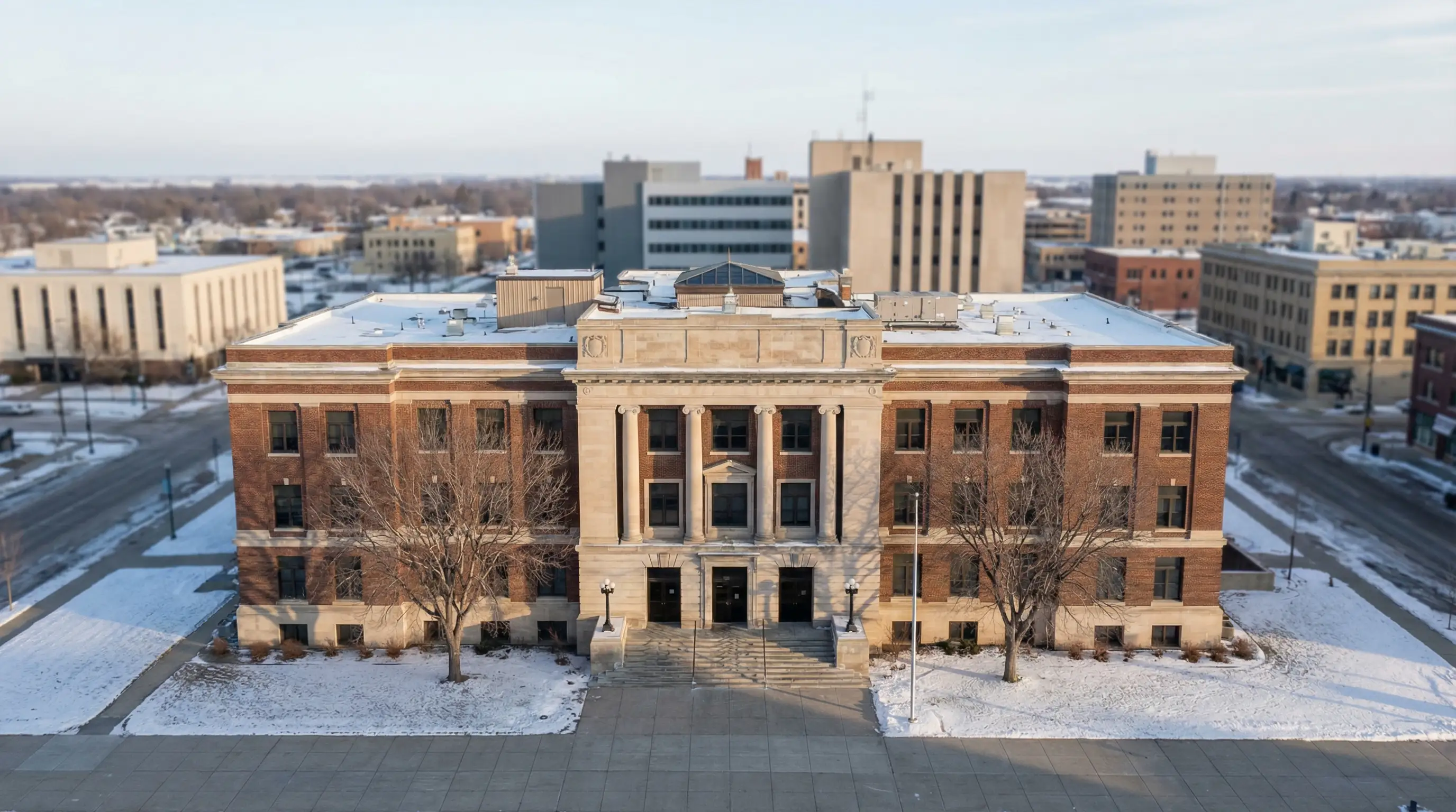Legal consultation room inside a Fargo, ND law office with attorney and client seated at a conference table