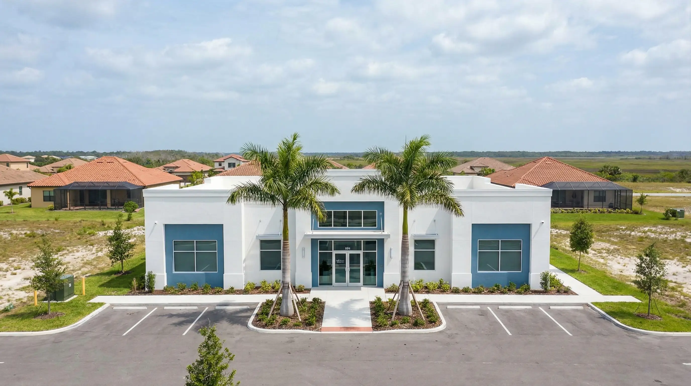 Modern dental consultation room with dentist and patient reviewing treatment options in Palm Bay, FL