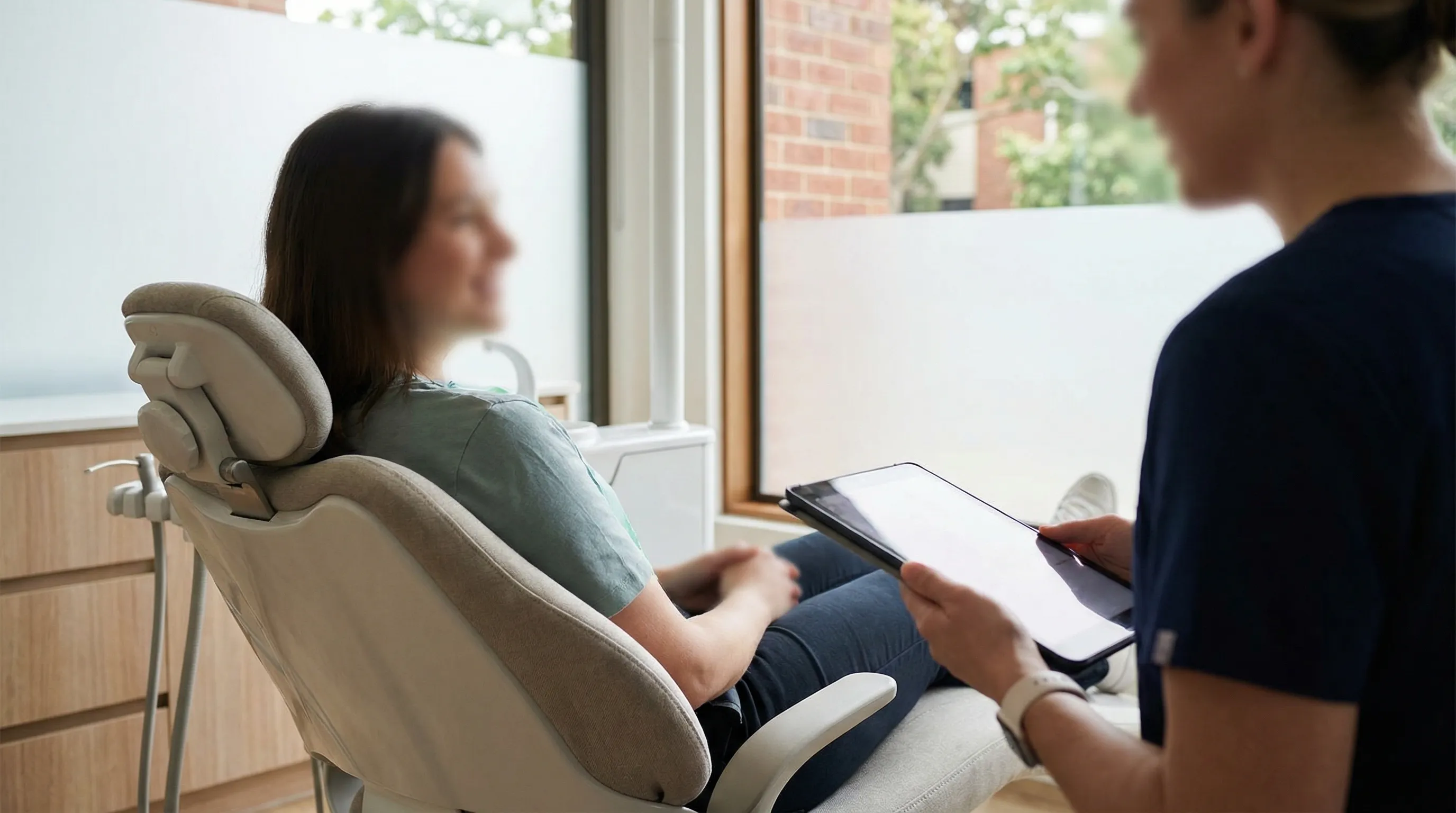 Professional dental practice interior in Cambridge, MA with modern treatment room and brick architecture