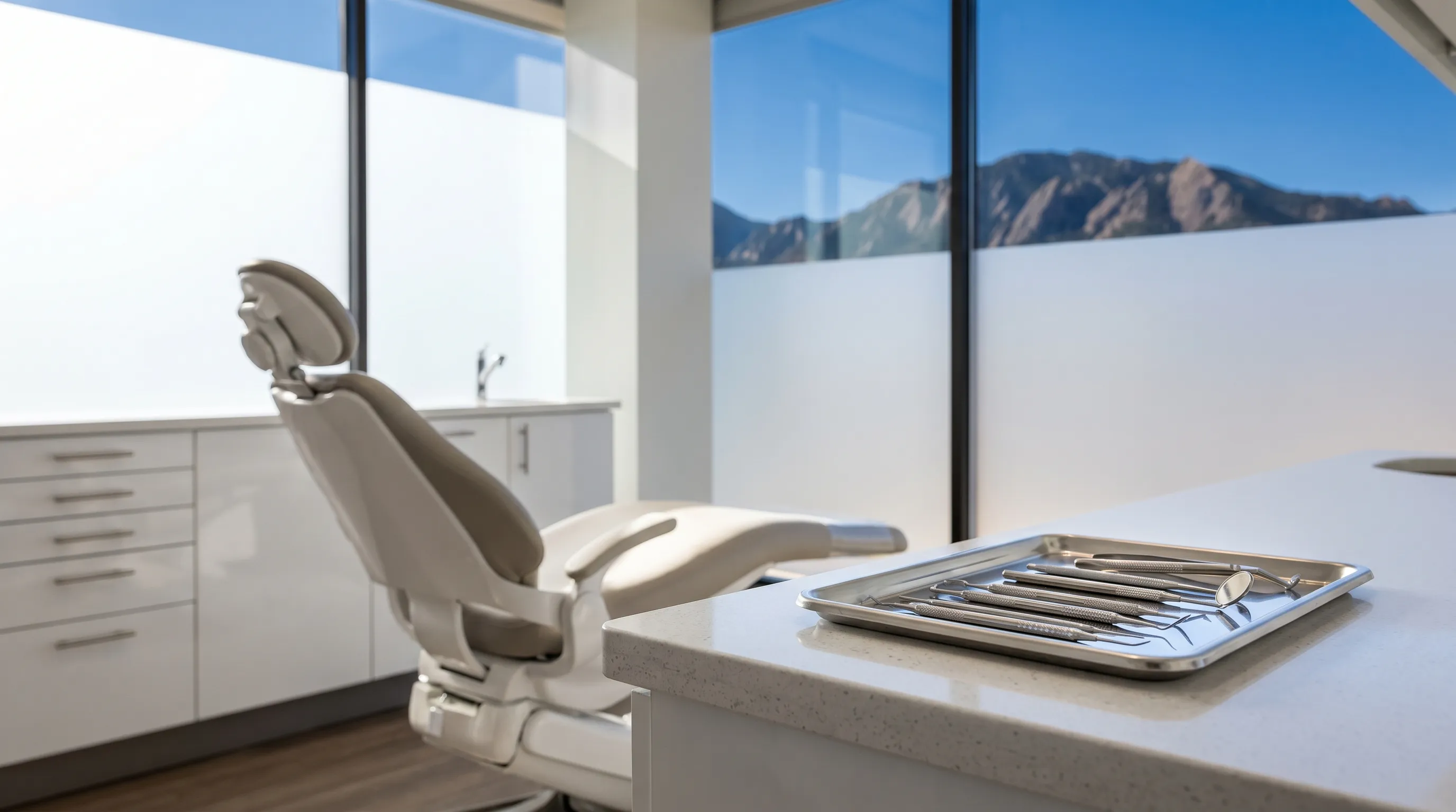Modern dental operatory with natural light and clinical instruments in contemporary Boulder CO practice