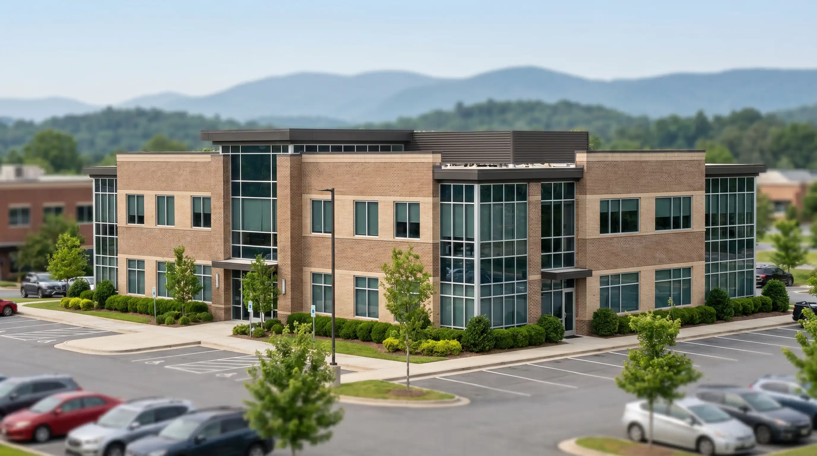 Dentist in white coat and mask leaning over a patient in a dental chair in a bright modern operatory, digital X-ray panel mounted on the wall, assistant handing over an instrument, warm professional lighting in a well-appointed Roanoke dental practice