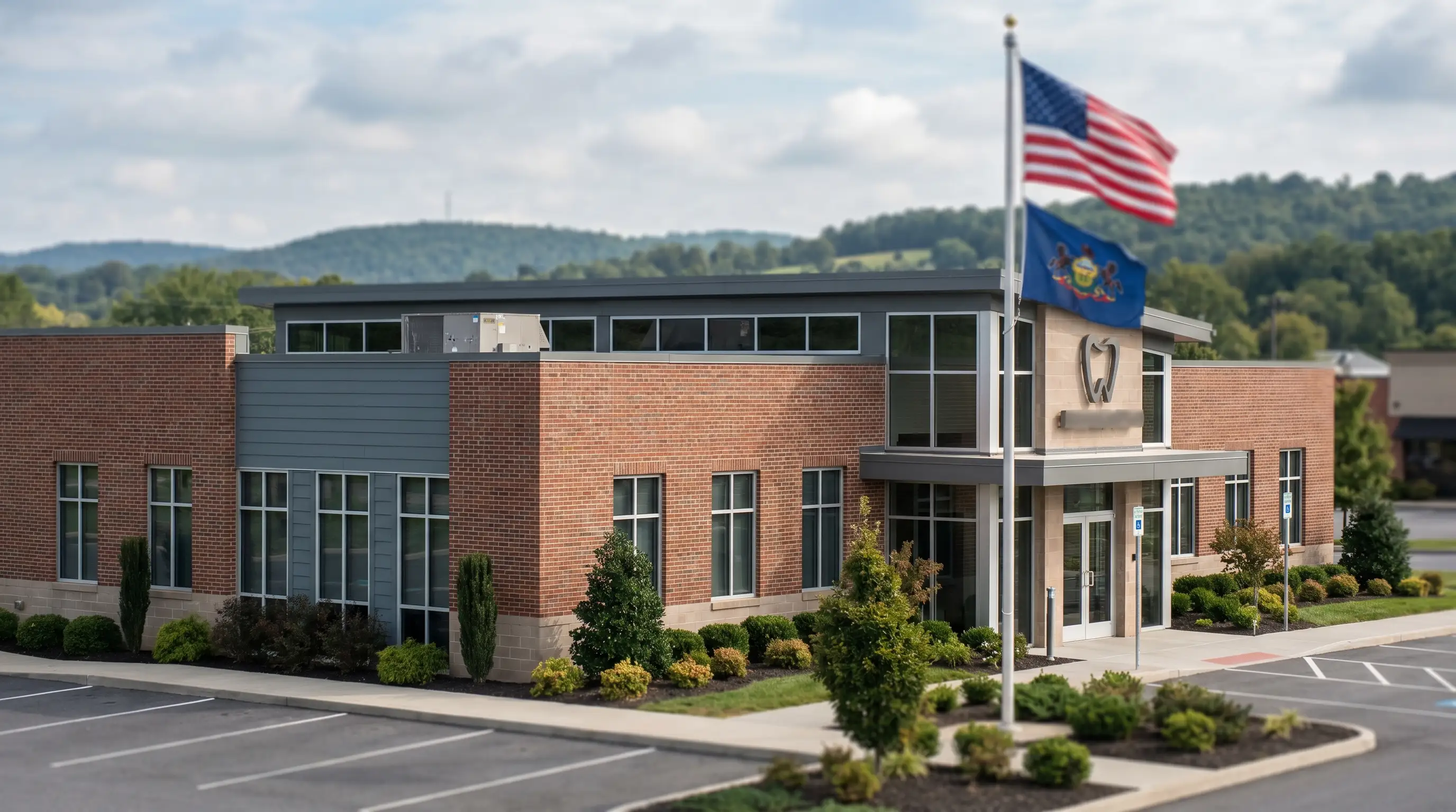 Friendly dentist in scrubs working with a patient in a modern dental operatory in Reading, PA with bright professional lighting and clean clinical environment