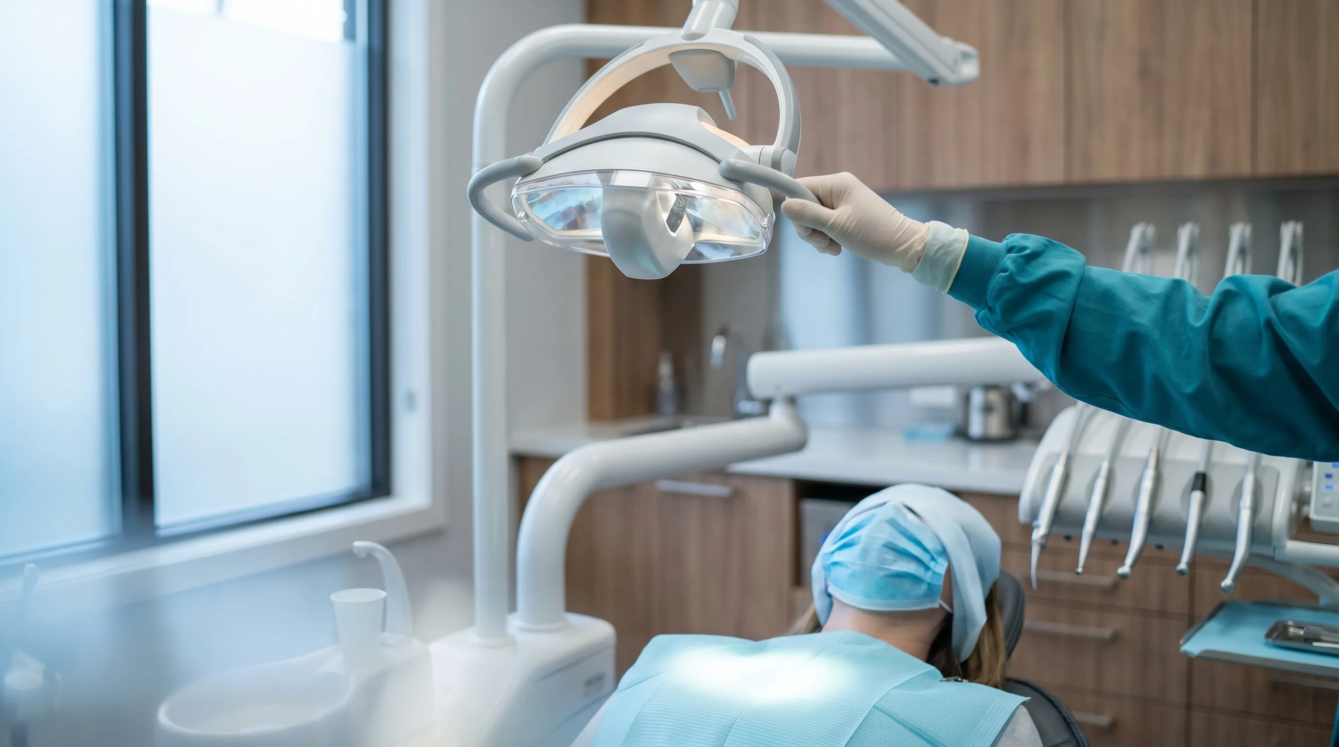 Professional dentist working with a patient in a modern Erie, PA dental practice