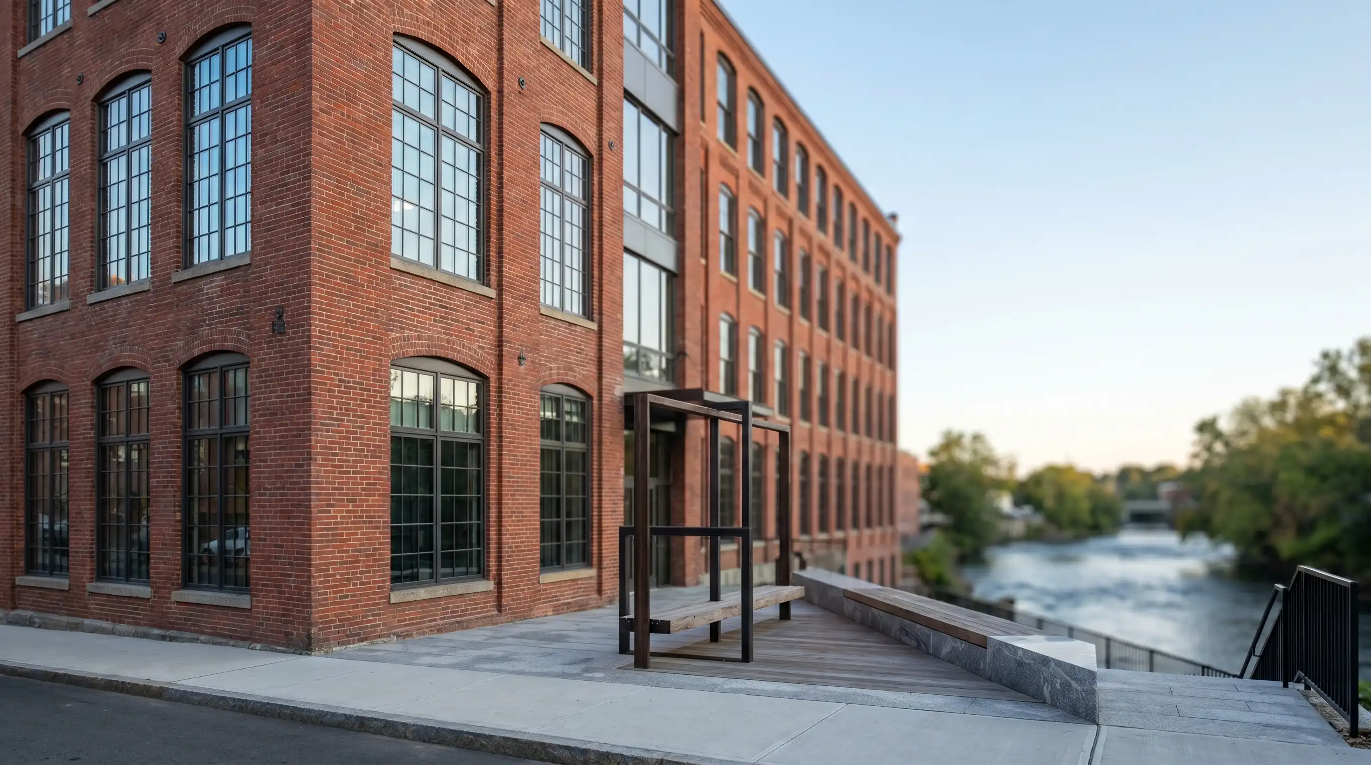 Real estate agent walking a young couple through a renovated mill-district home in Pawtucket, RI