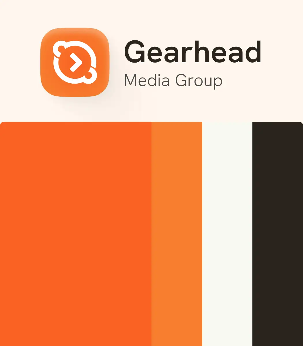 Logo for Gearhead Media Group featuring a rounded square orange icon with a white circular gear and arrow inside, alongside the text 'Gearhead Media Group'. Below the logo is a design of vertical stripes in shades of orange, white, and black.