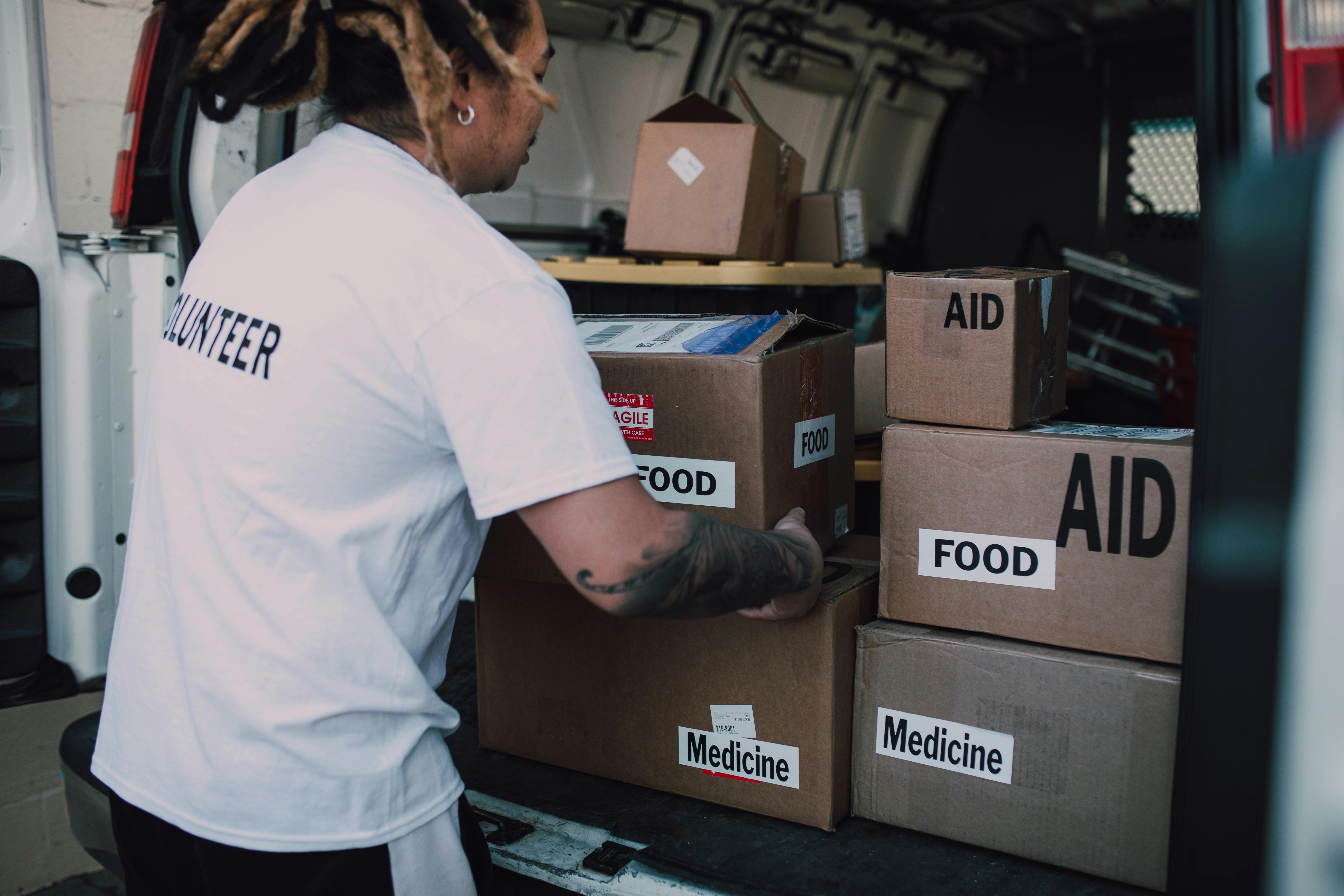 Volunteer carrying medicines