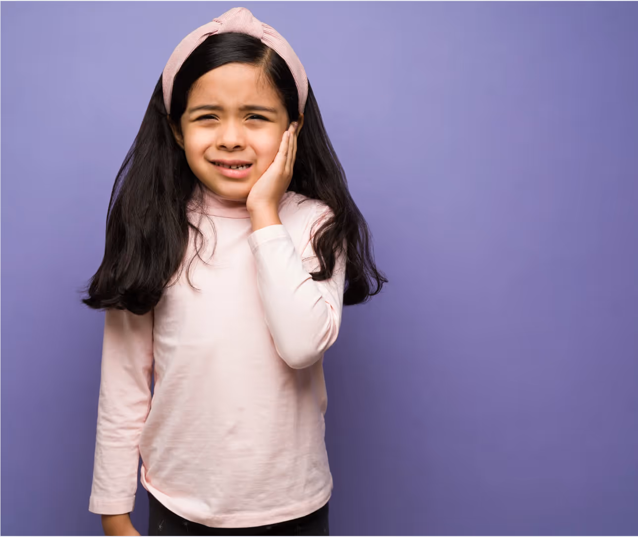 Girl with a toothache