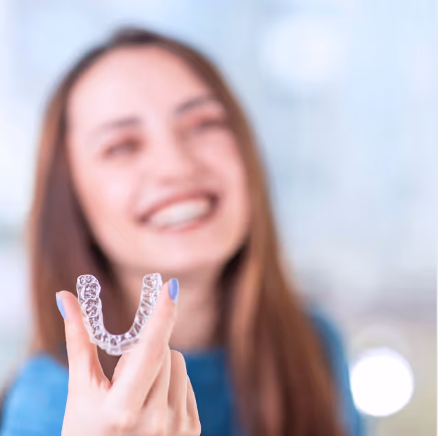 Woman holding Invisalign