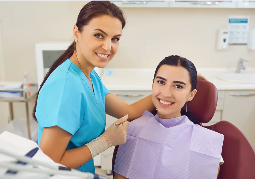 Dentist and Patient Smiling
