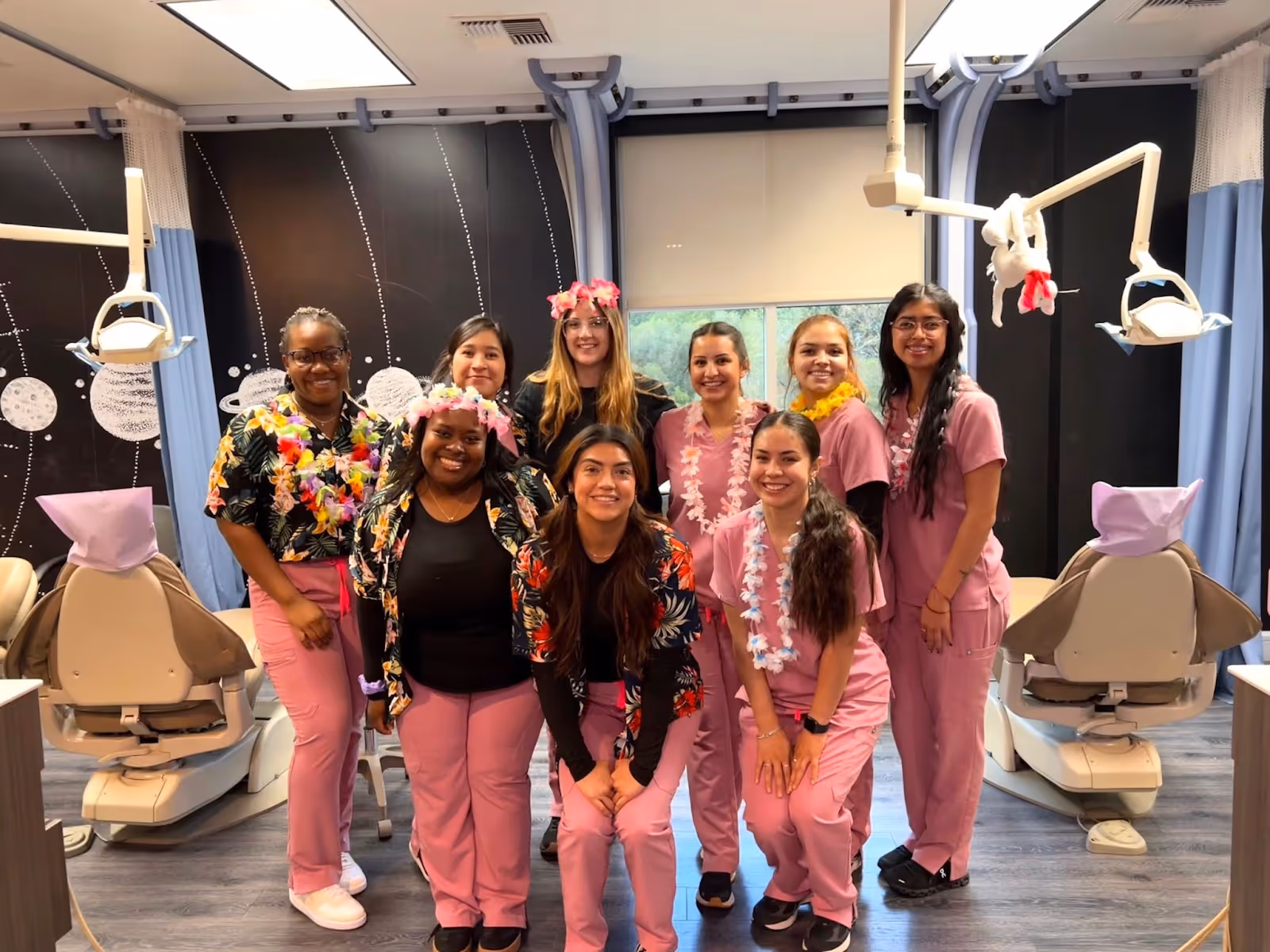 AKD team dressed in their Hawaiian Luau gear