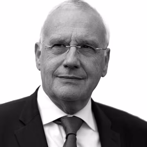 Elderly professional in suit and tie, black and white portrait
