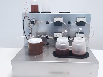 Scientific laboratory equipment with multiple containers and measuring devices