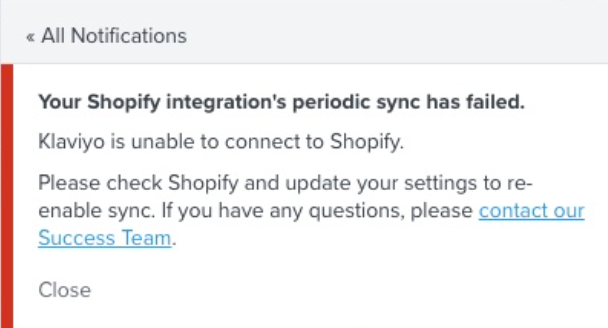 Klaviyo notification banner warning that Shopify integration’s periodic sync has failed due to connection issues, with instructions to re-enable sync