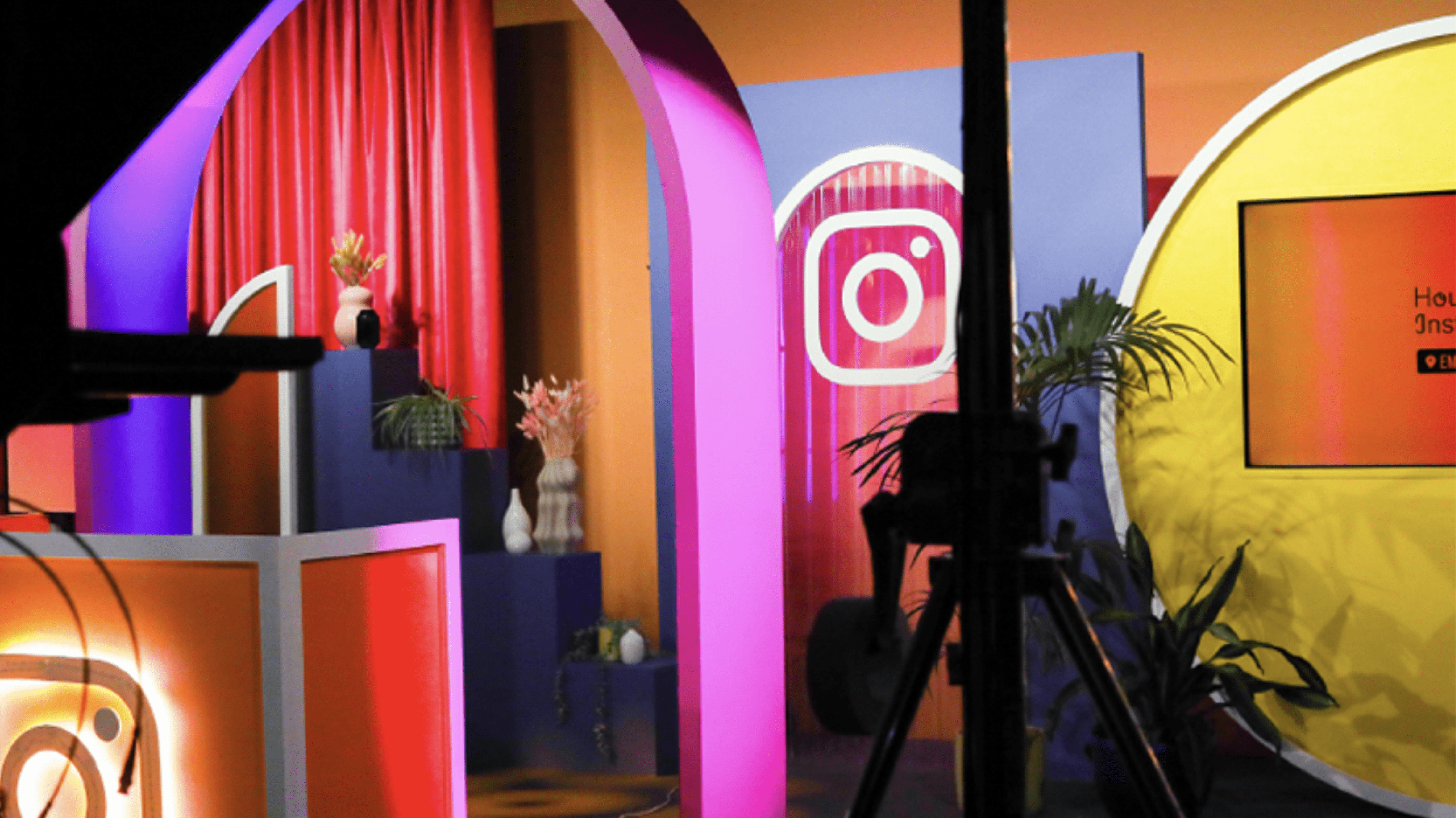 Colorful Instagram-themed interior with photo sets and pink lighting