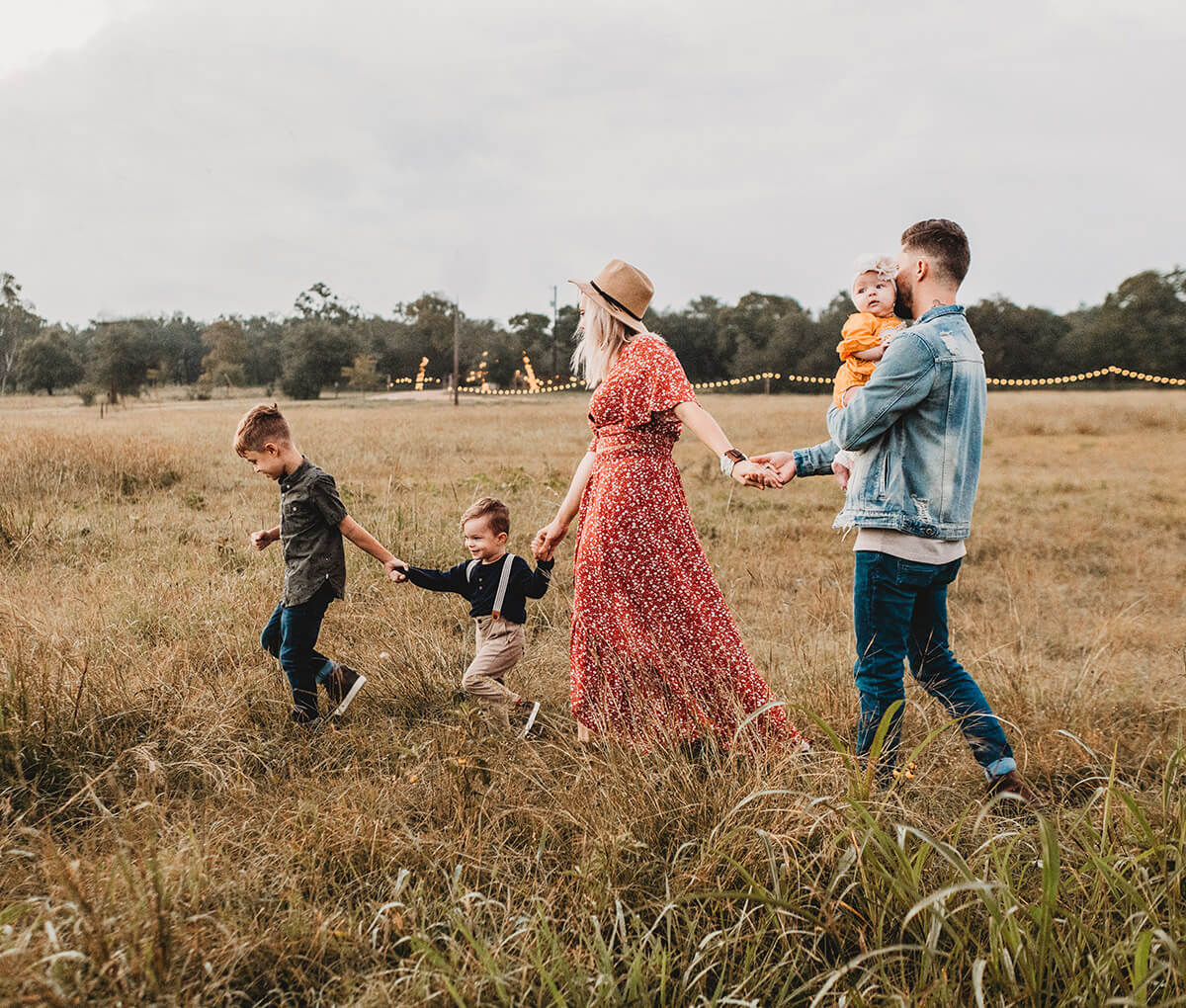 Family running on the fields - Blume Photography Webflow Template