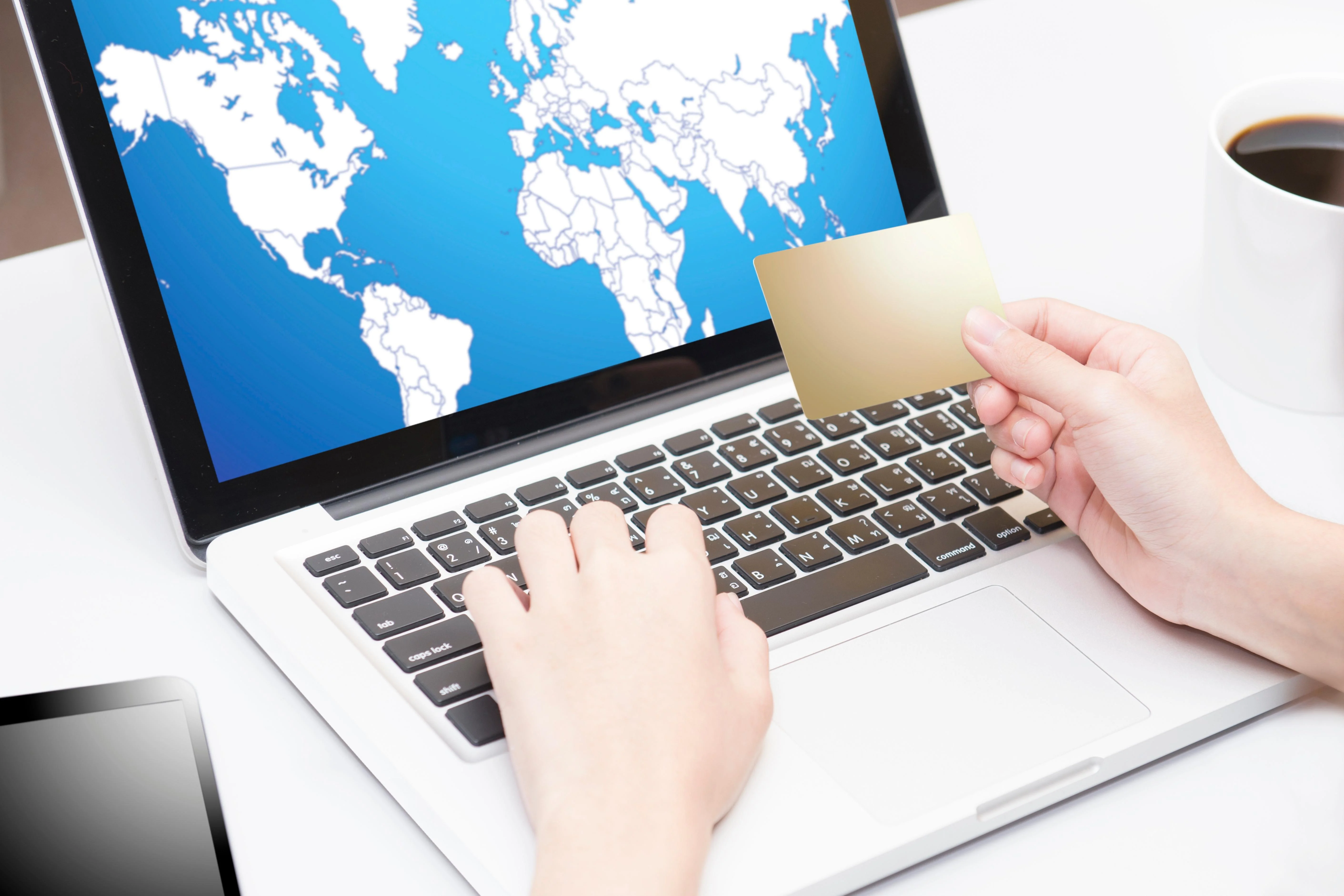 Cross-border e-commerce payment on a laptop.