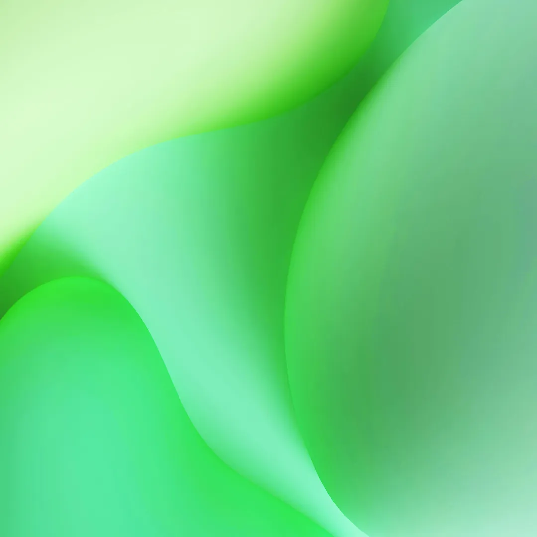 Abstrakt grön bakgrund med mjuka, flytande former och ljusa övergångar.