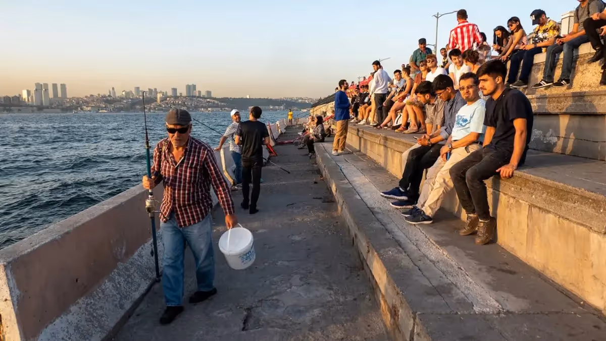Fishermen and others nearby waterfront