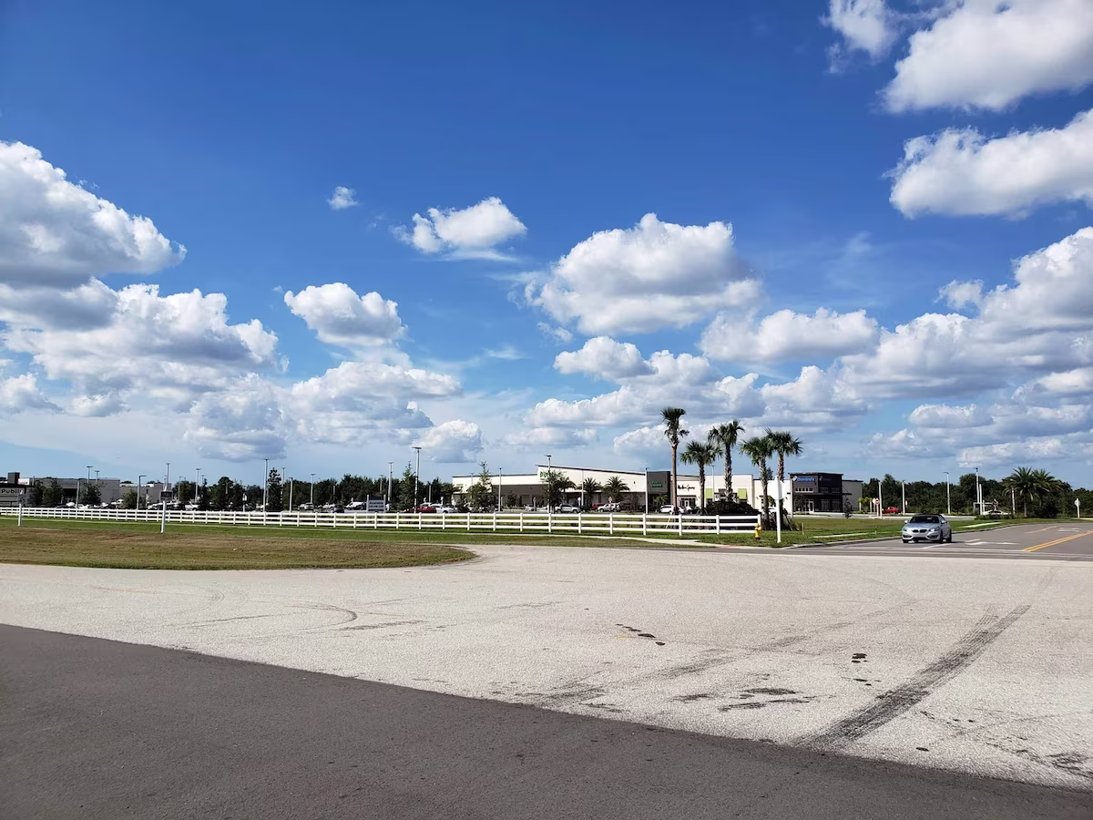 Large empty lot with Public in the background