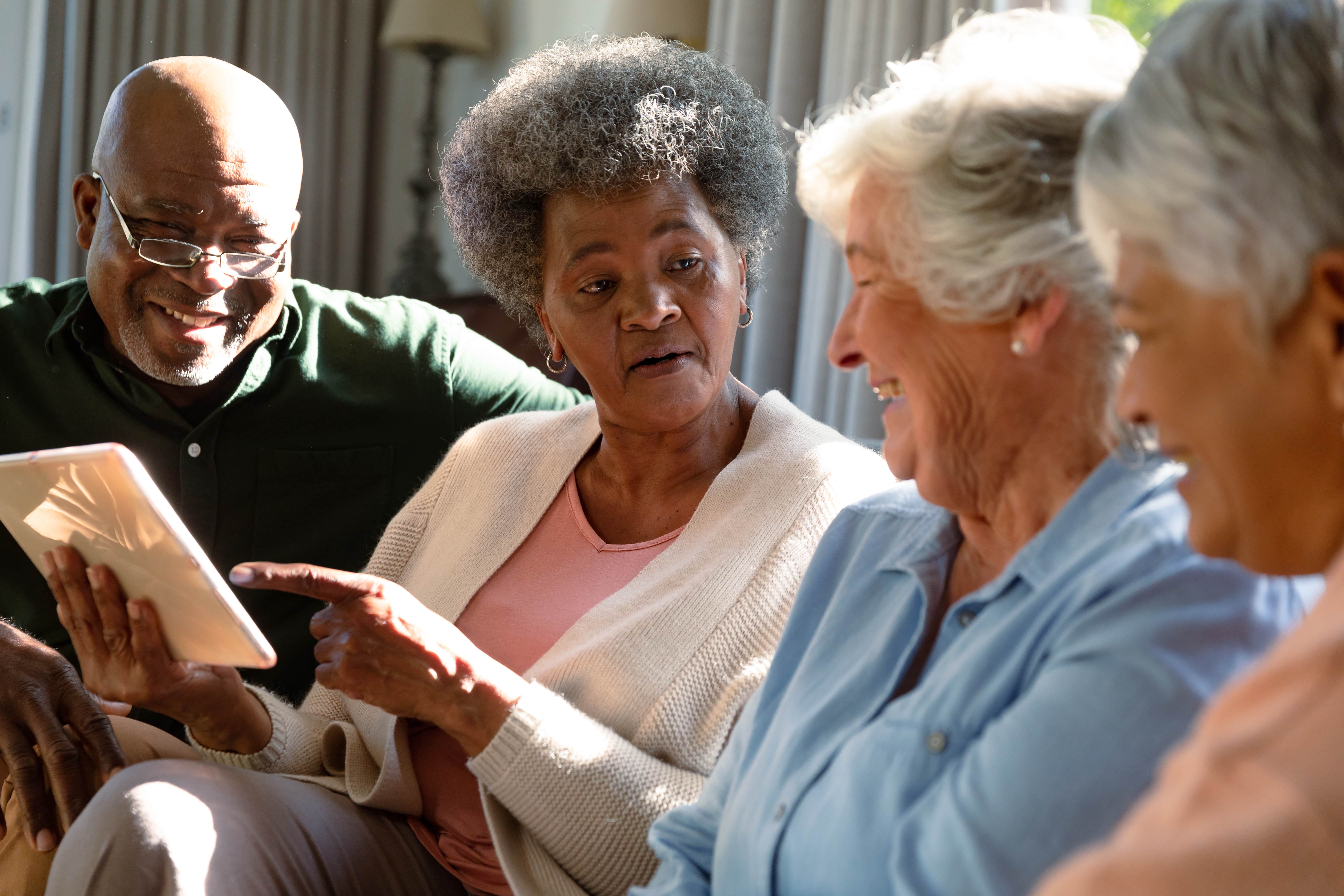 seniors on couch stock image