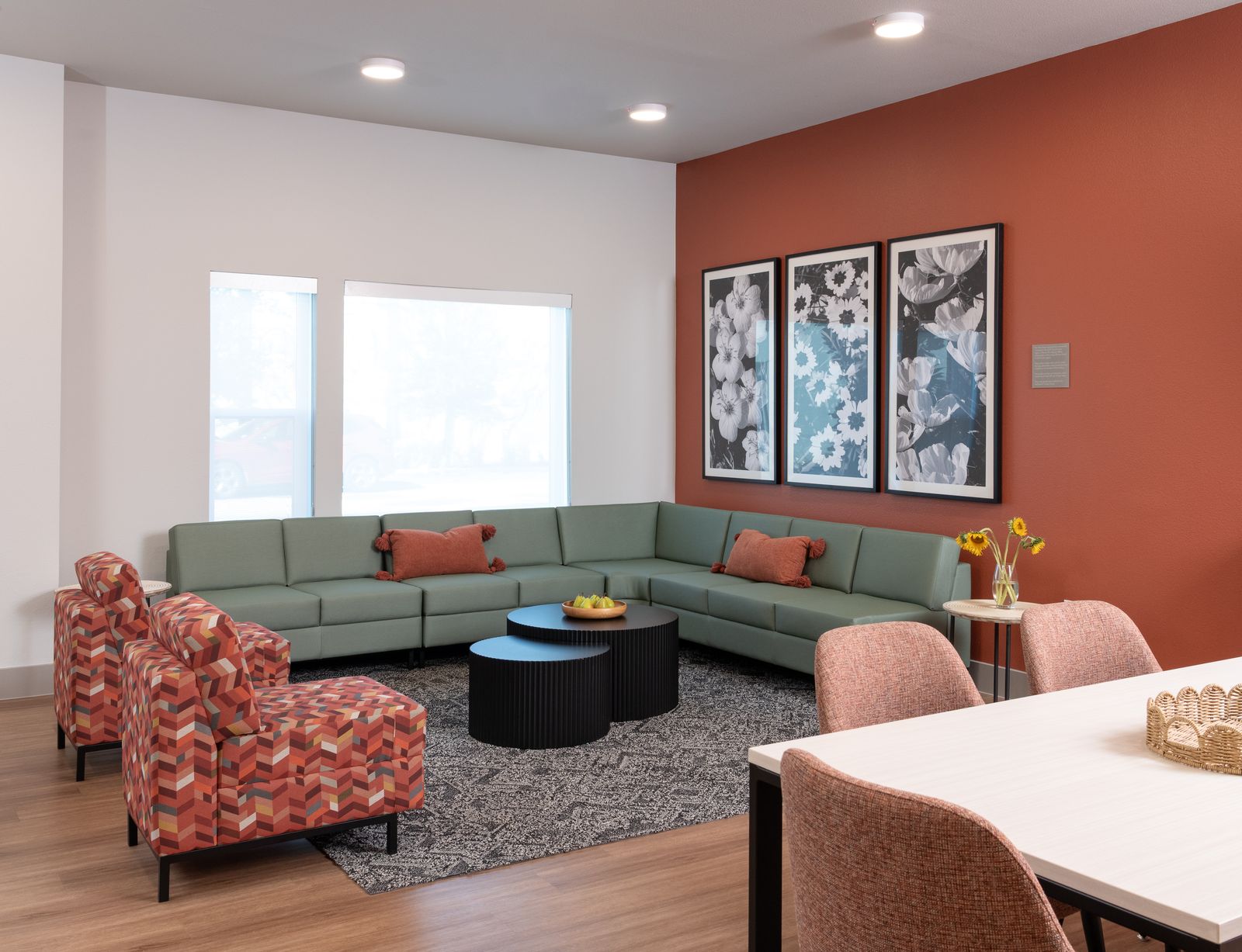 Wide view of community room with seating