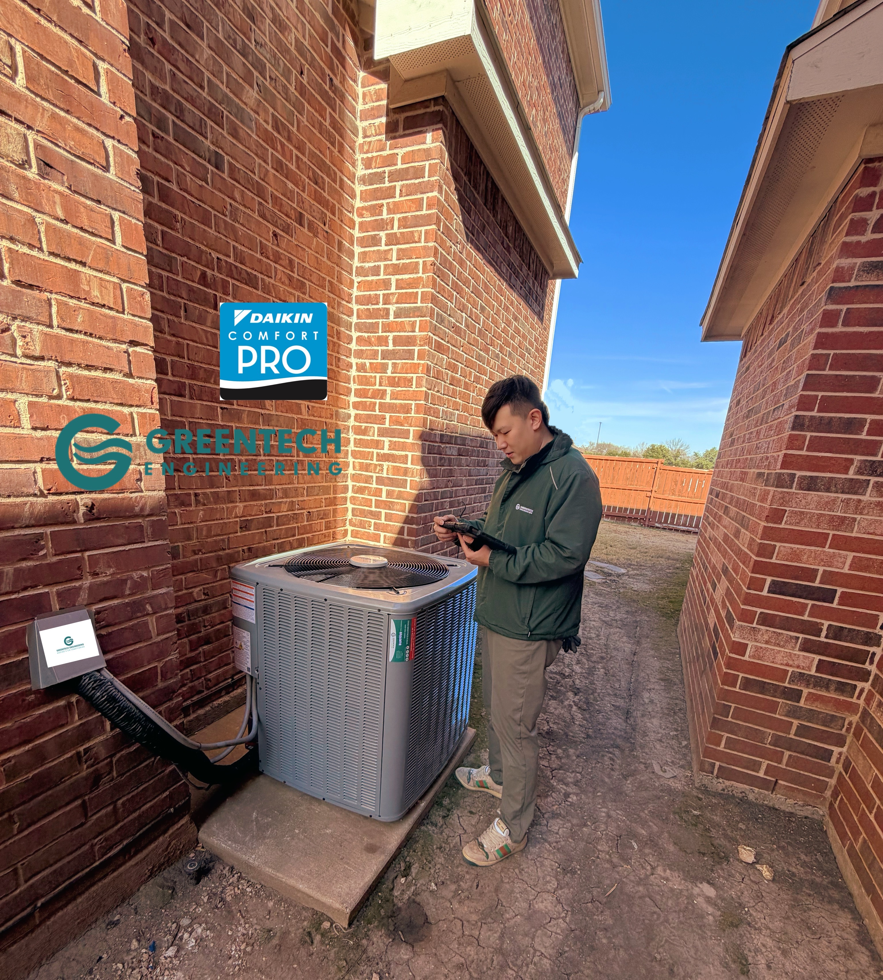 Newly installed Daikin 14.3 SEER2 heat pump outdoor unit on concrete pad in Forney, TX 75126, installed by Greentech Engineering to replace an aging Carrier system. ENGINEER ON JOBSITE