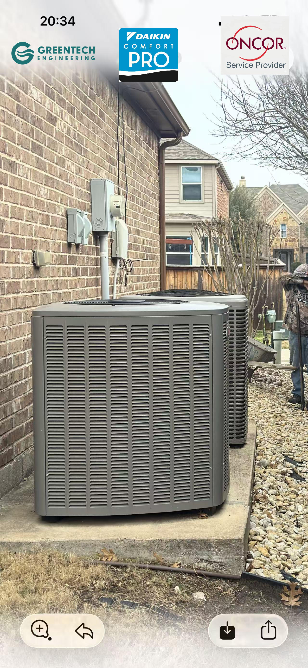Old and inefficient York air conditioning condenser units sitting outside a brick residential home in Grand Prairie, TX.