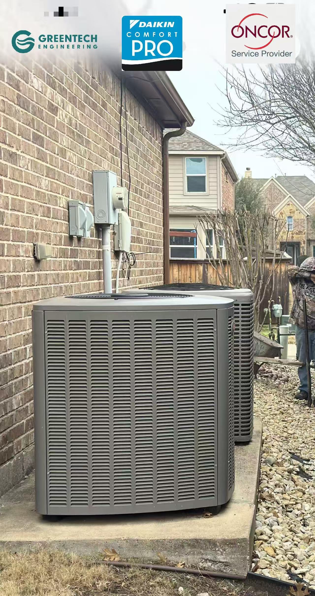 Old and inefficient York air conditioning condenser units sitting outside a brick residential home in Grand Prairie, TX.