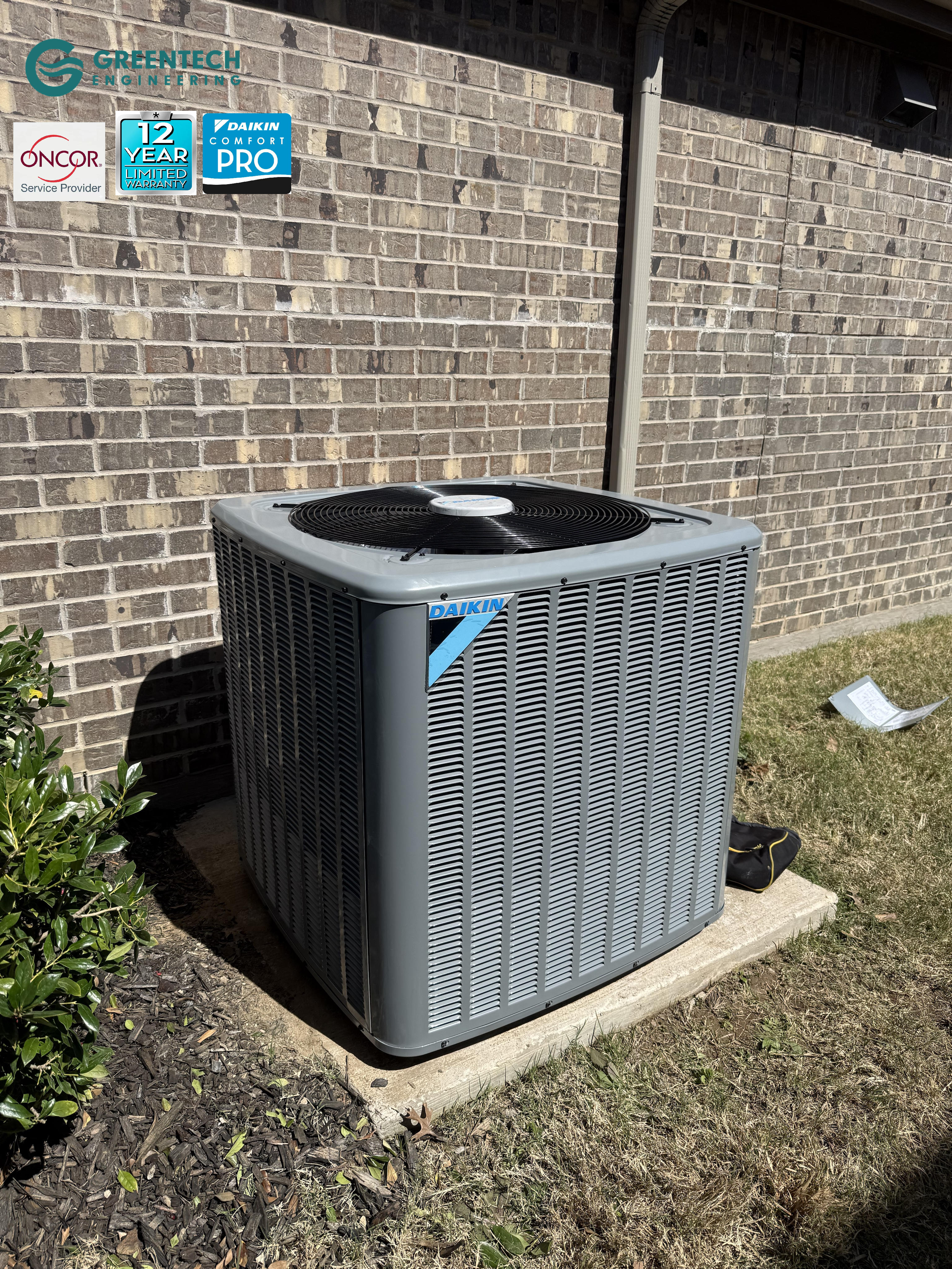 Fully installed Daikin 3.5 Ton 14.5 SEER2 air conditioner condenser outside a brick home in Little Elm with Daikin Comfort Pro and 12-Year Warranty trust badges.