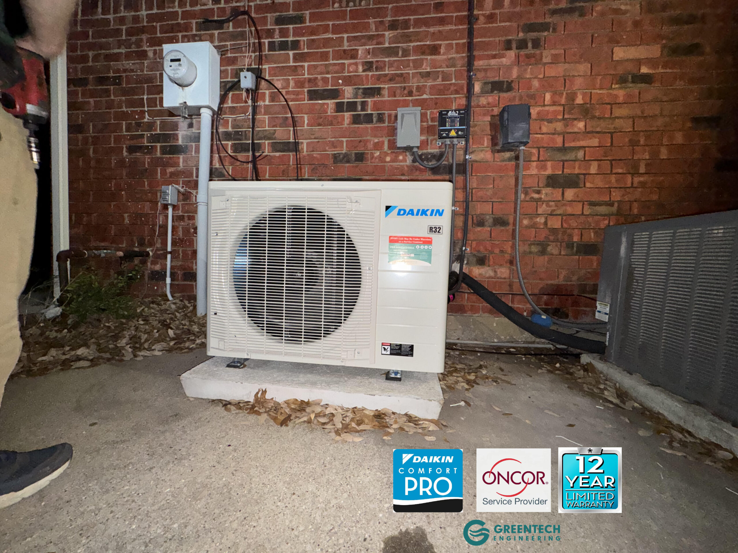 A newly installed, premium high-efficiency HVAC condenser sitting perfectly level on a concrete pad in Fort Worth, Texas.