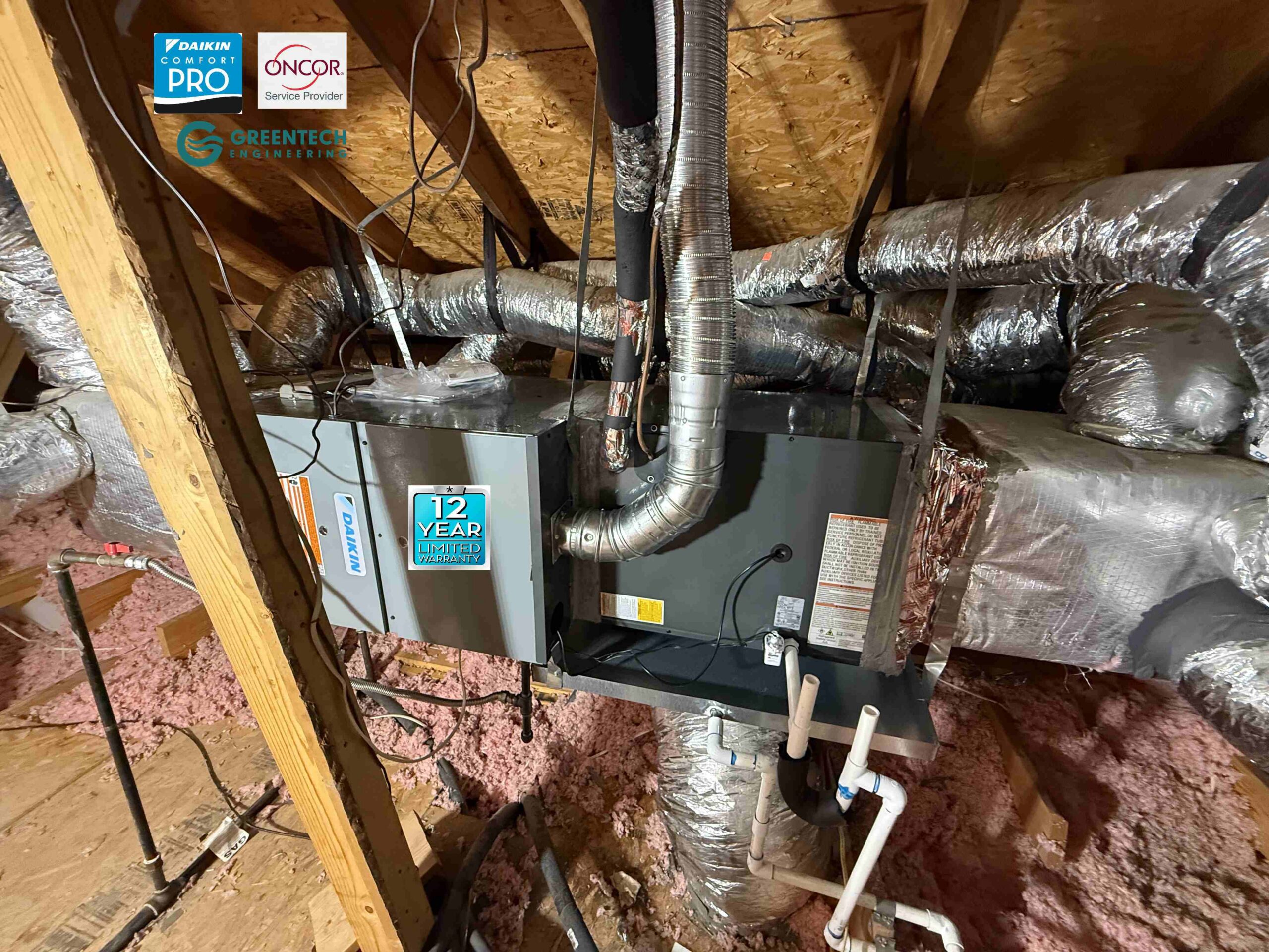 A brand new Daikin 80% AFUE horizontal gas furnace and cased evaporator coil installed cleanly in a Little Elm residential attic, featuring the Oncor Service Provider badge and custom ductwork connections.