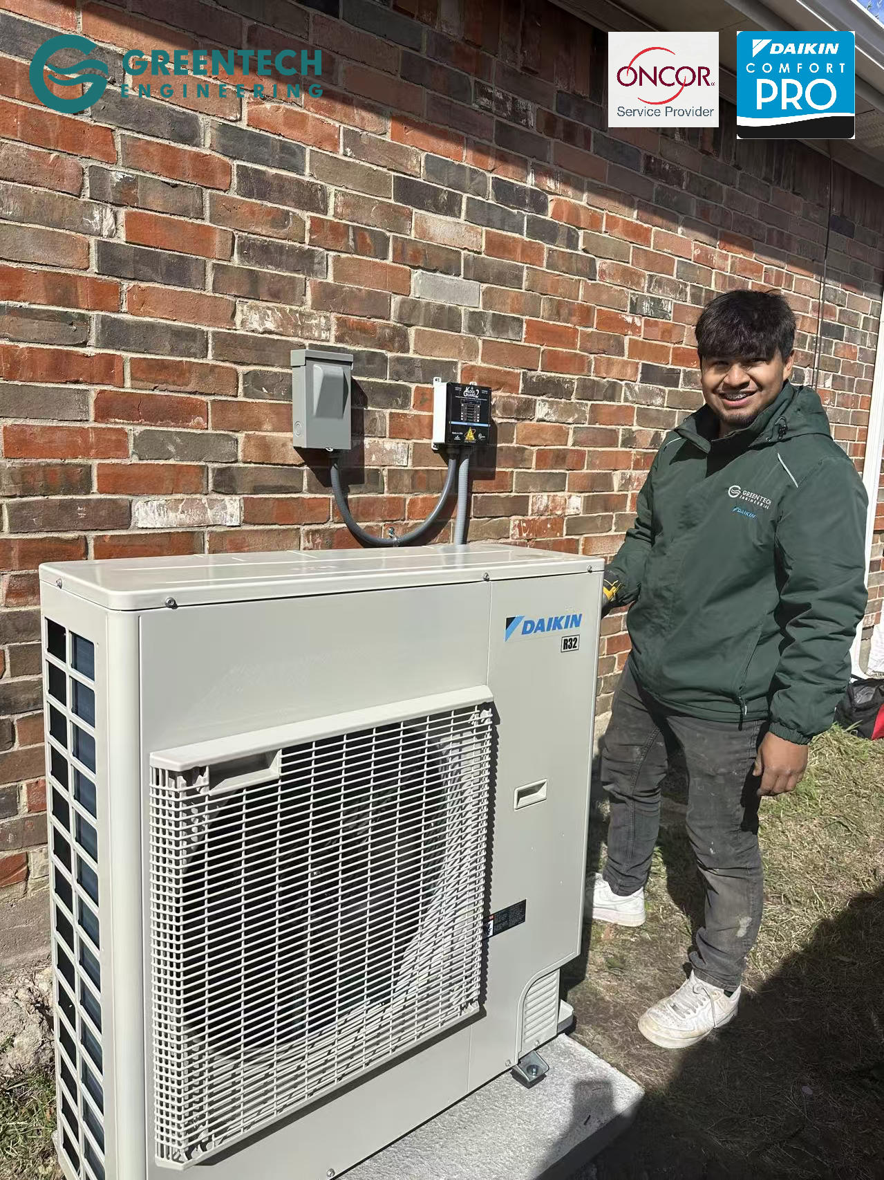 Smiling Greentech Engineering technician standing next to a newly installed Daikin FIT side-discharge heat pump in Allen, Texas