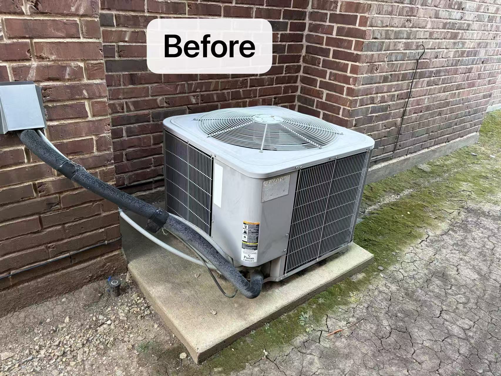 An aging, inefficient single-stage AC condenser in a Dallas residential neighborhood that causes high utility bills and grid strain.