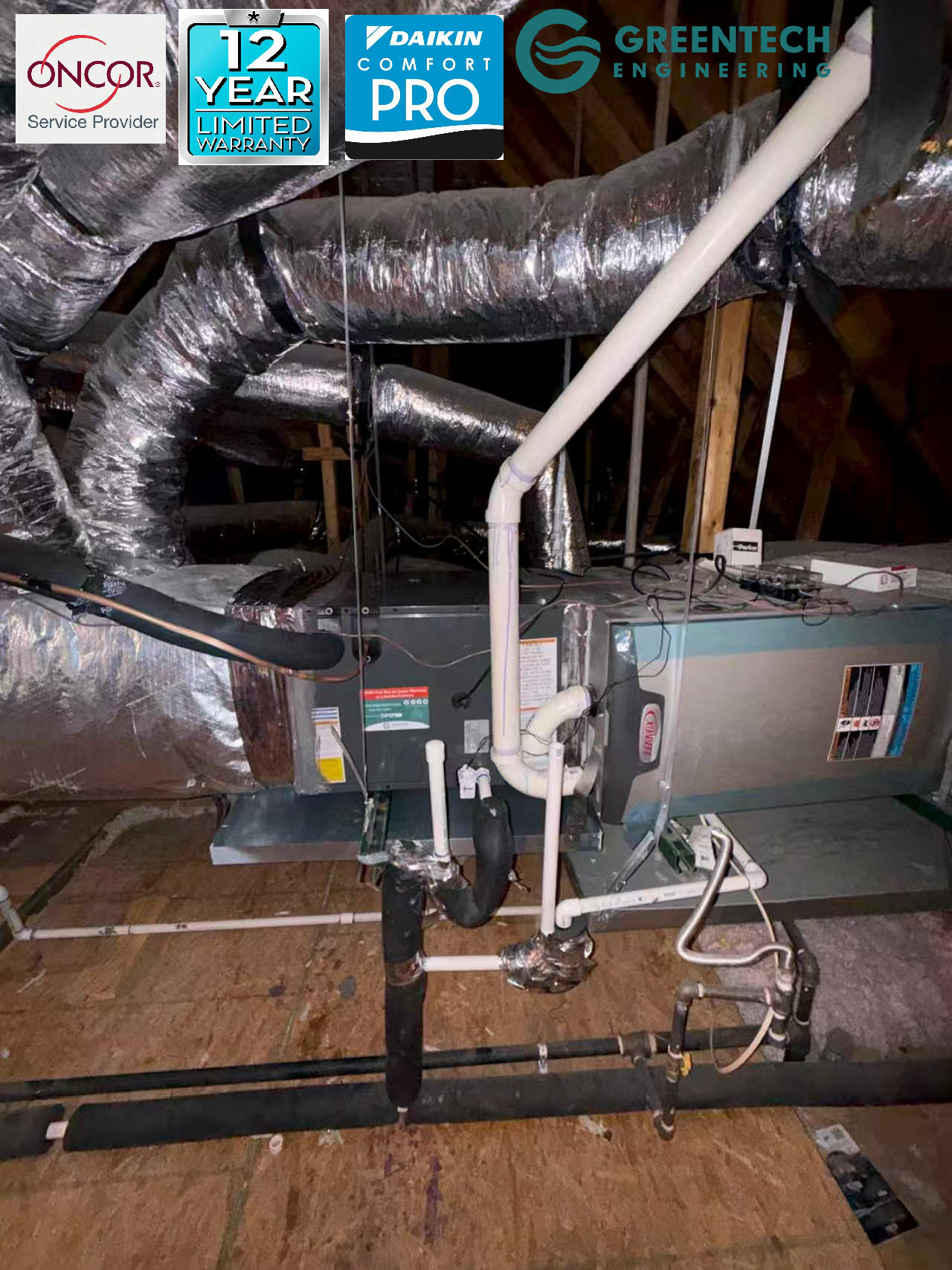 A new Daikin horizontal cased evaporator coil and gas furnace installed in a residential attic, featuring a new drain pan and PVC condensate lines.