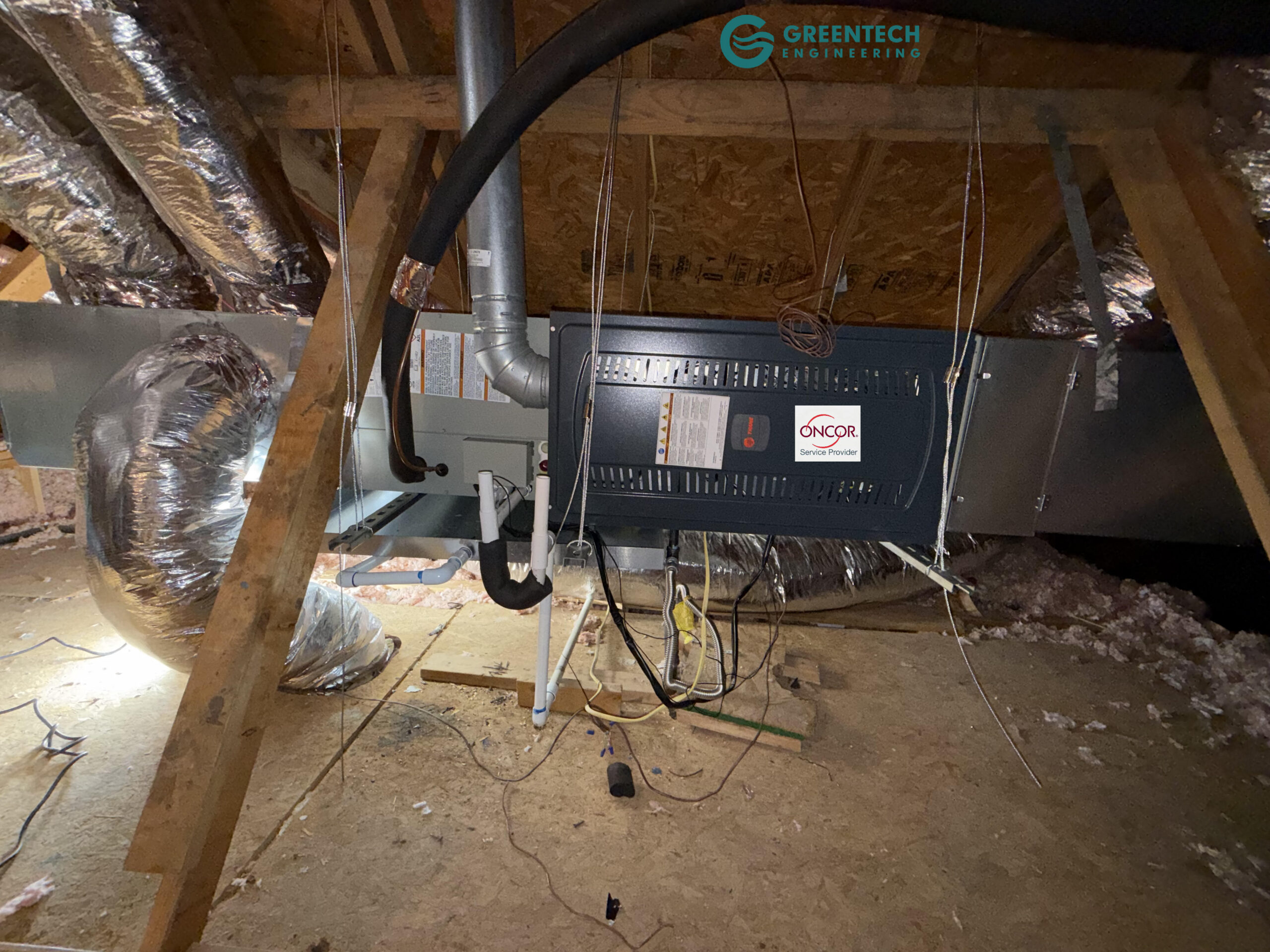 A brand new Trane 80% AFUE horizontal gas furnace and cased evaporator coil installed cleanly in an Allen residential attic, featuring the Oncor Service Provider badge.
