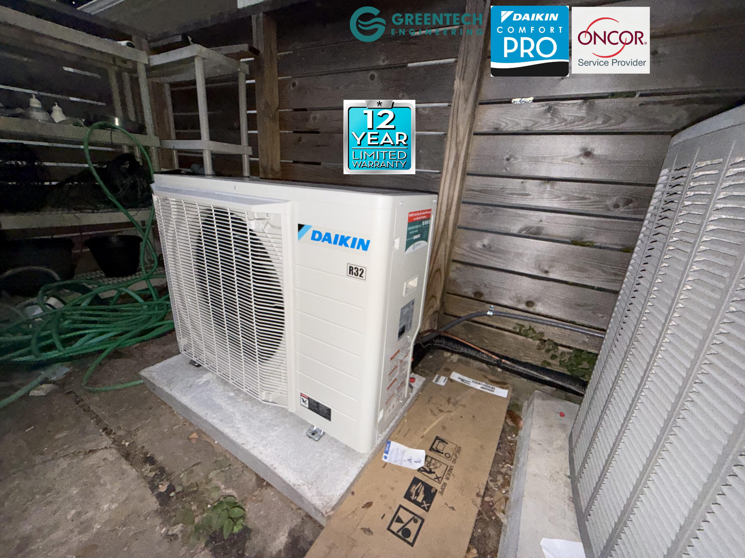 A newly installed, ultra-efficient Daikin Fit 2.5-Ton side-discharge variable-speed air conditioning condenser on a clean concrete pad in Fort Worth, TX 76116.