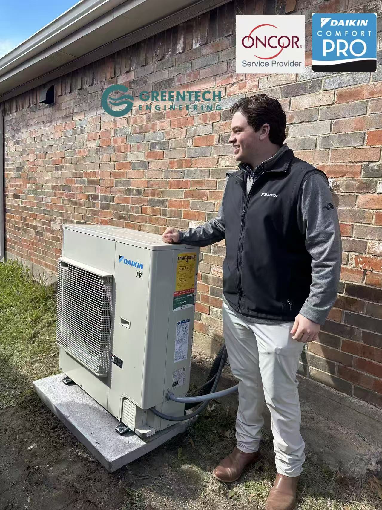  Daikin FIT 3.5-ton heat pump condenser installed by Greentech Engineering in Grand Prairie, TX alongside a Daikin Comfort Pro representative
