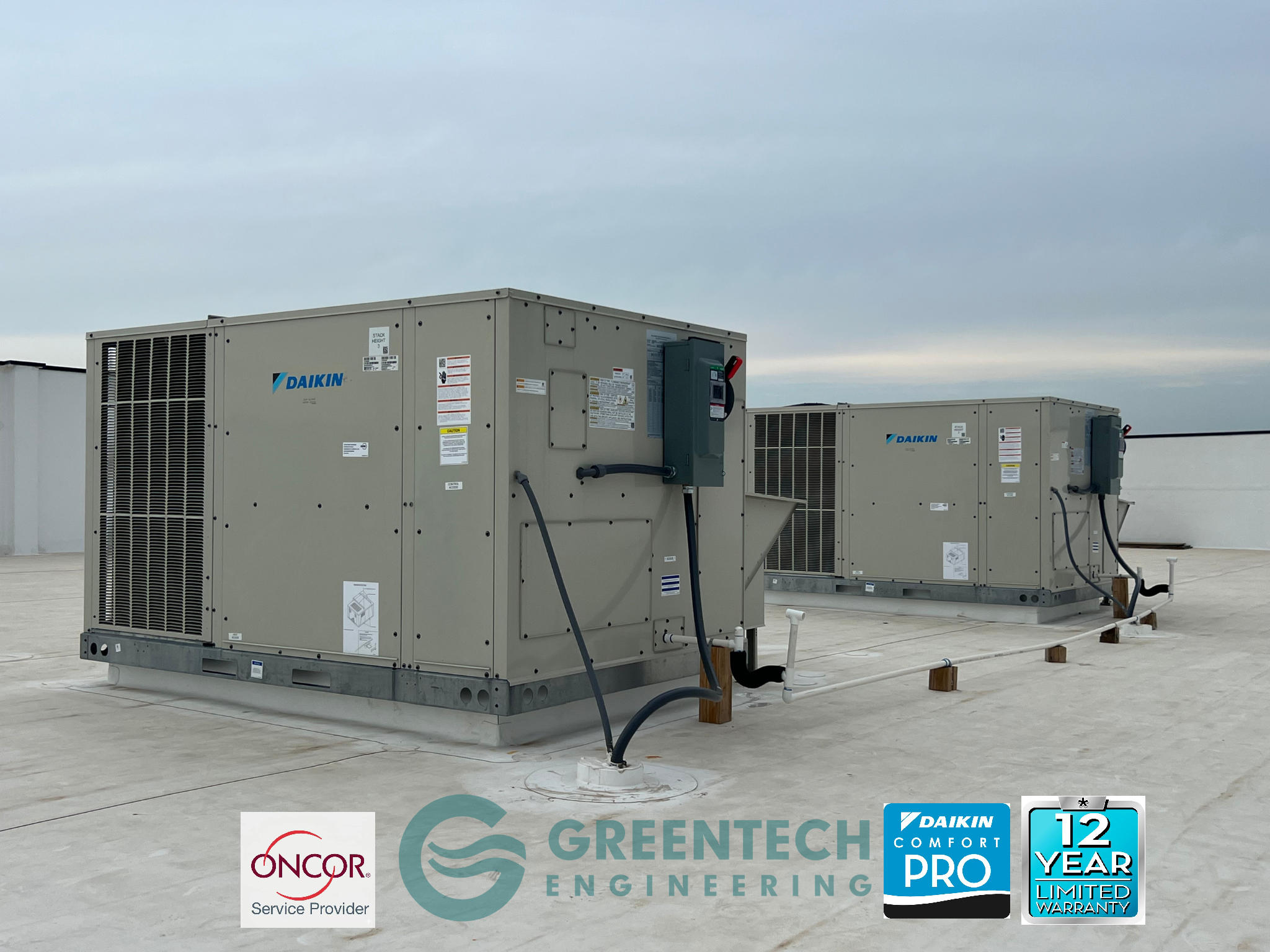 A Greentech Engineering HVAC performing installation on a rooftop unit (RTU) at a Dallas multi-family apartment complex.