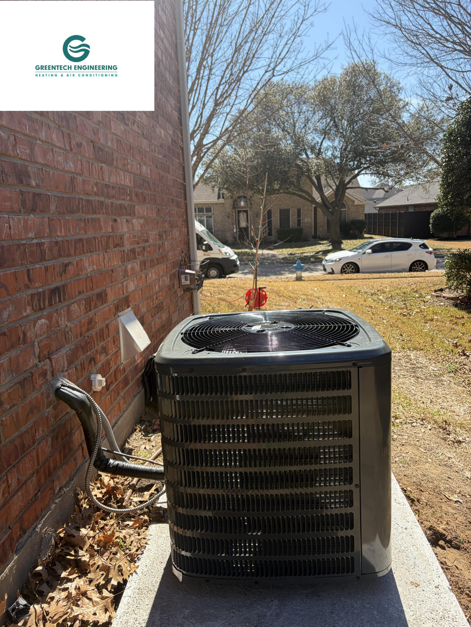 Newly installed, high-efficiency 3-ton Goodman AC condenser on a concrete pad in Grand Prairie, TX