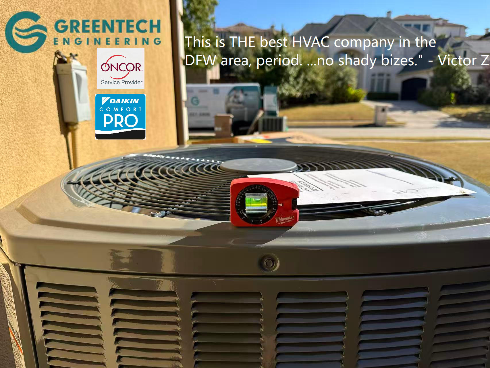 A red Milwaukee magnetic level sitting on top of a newly installed, perfectly leveled Daikin air conditioning condenser in Dallas, Texas.