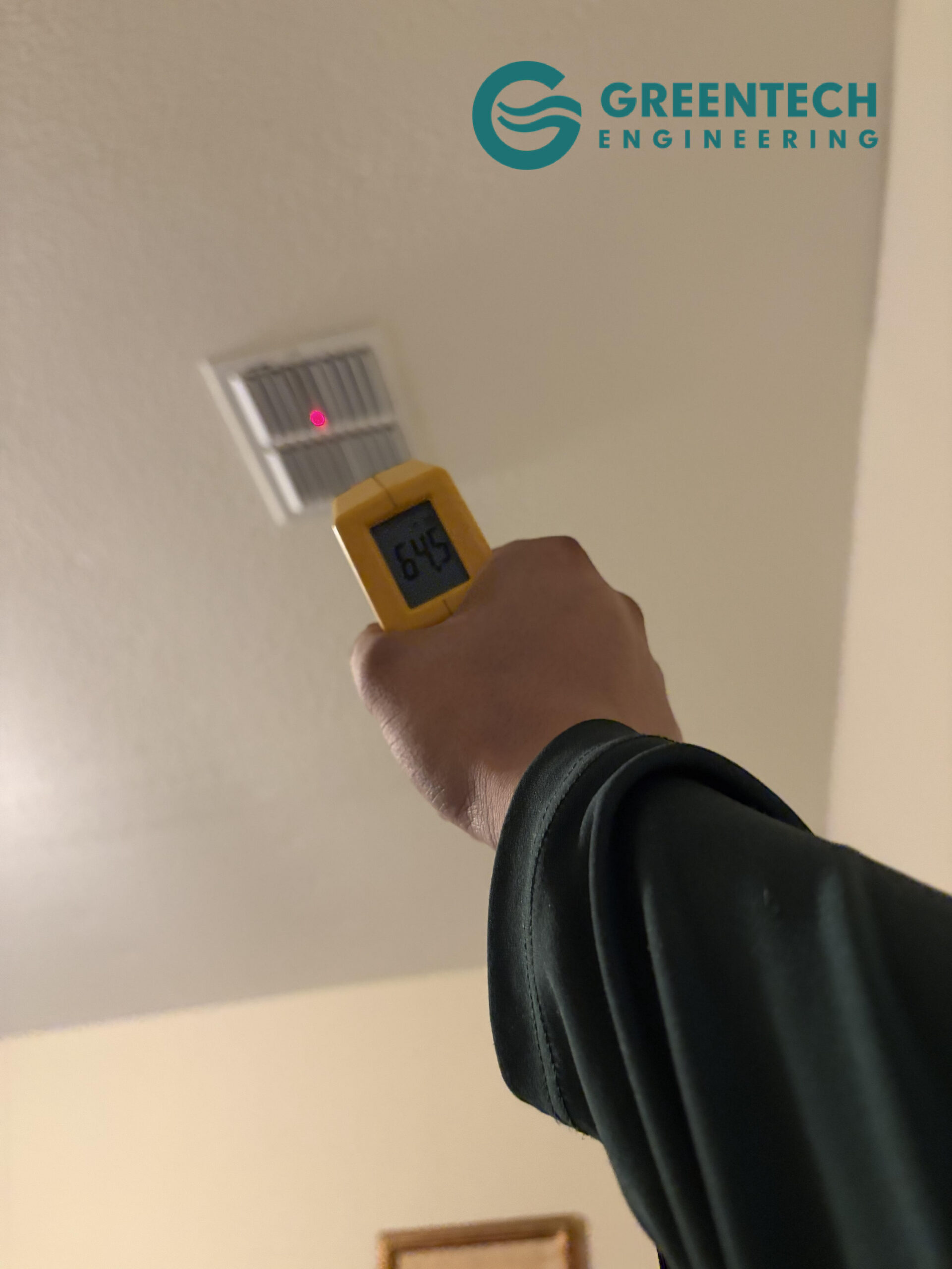 Infrared thermometer showing significant temperature discrepancies in residential HVAC supply vents