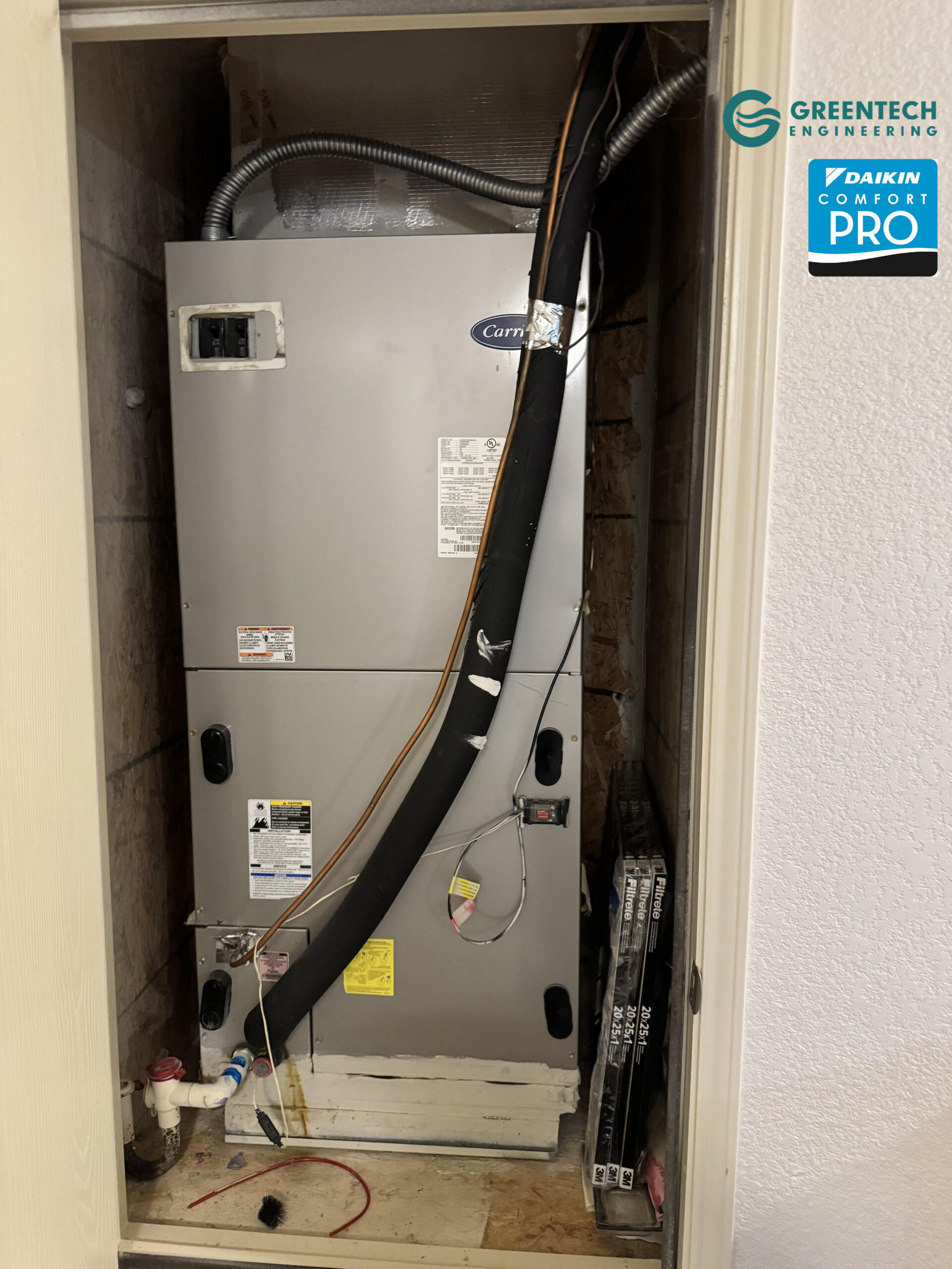 An aging, inefficient indoor air handler connected to deteriorating ductwork inside a Fort Worth, TX home before replacement.