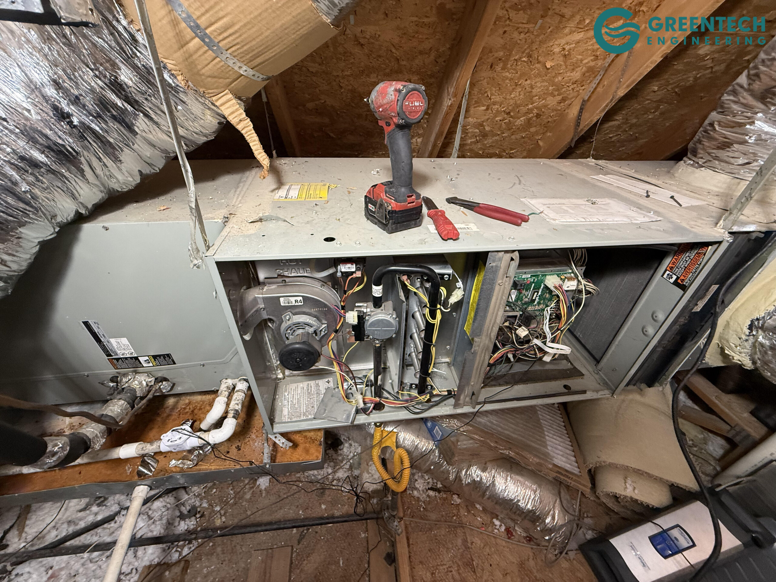 An older, inefficient indoor furnace and coil system with failing ductwork connections opened up in a Dallas, TX attic.