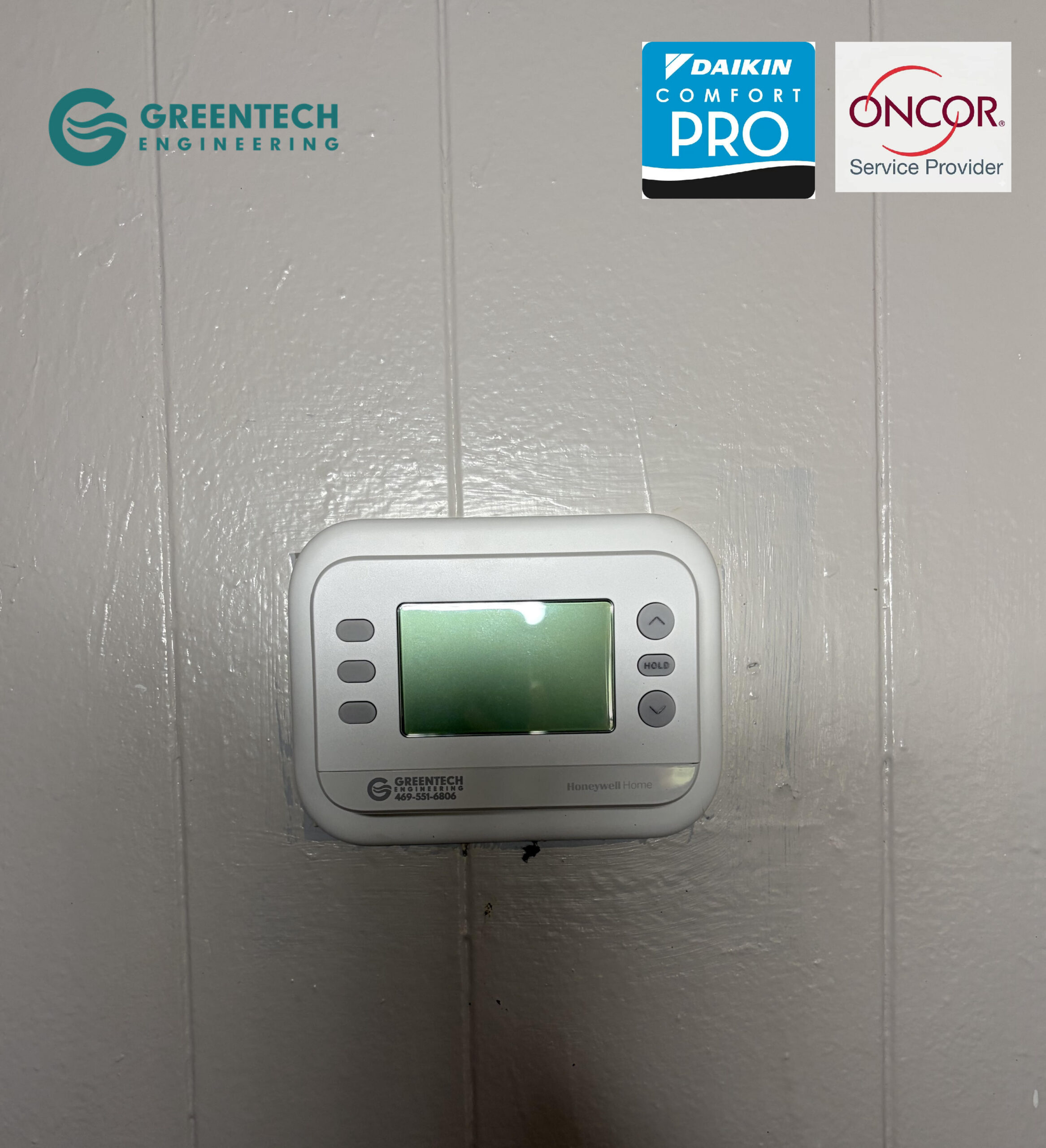 A new Greentech Engineering private label smart thermostat installed in a Little Elm home, featuring Daikin Comfort Pro and Oncor Service Provider trust badges.